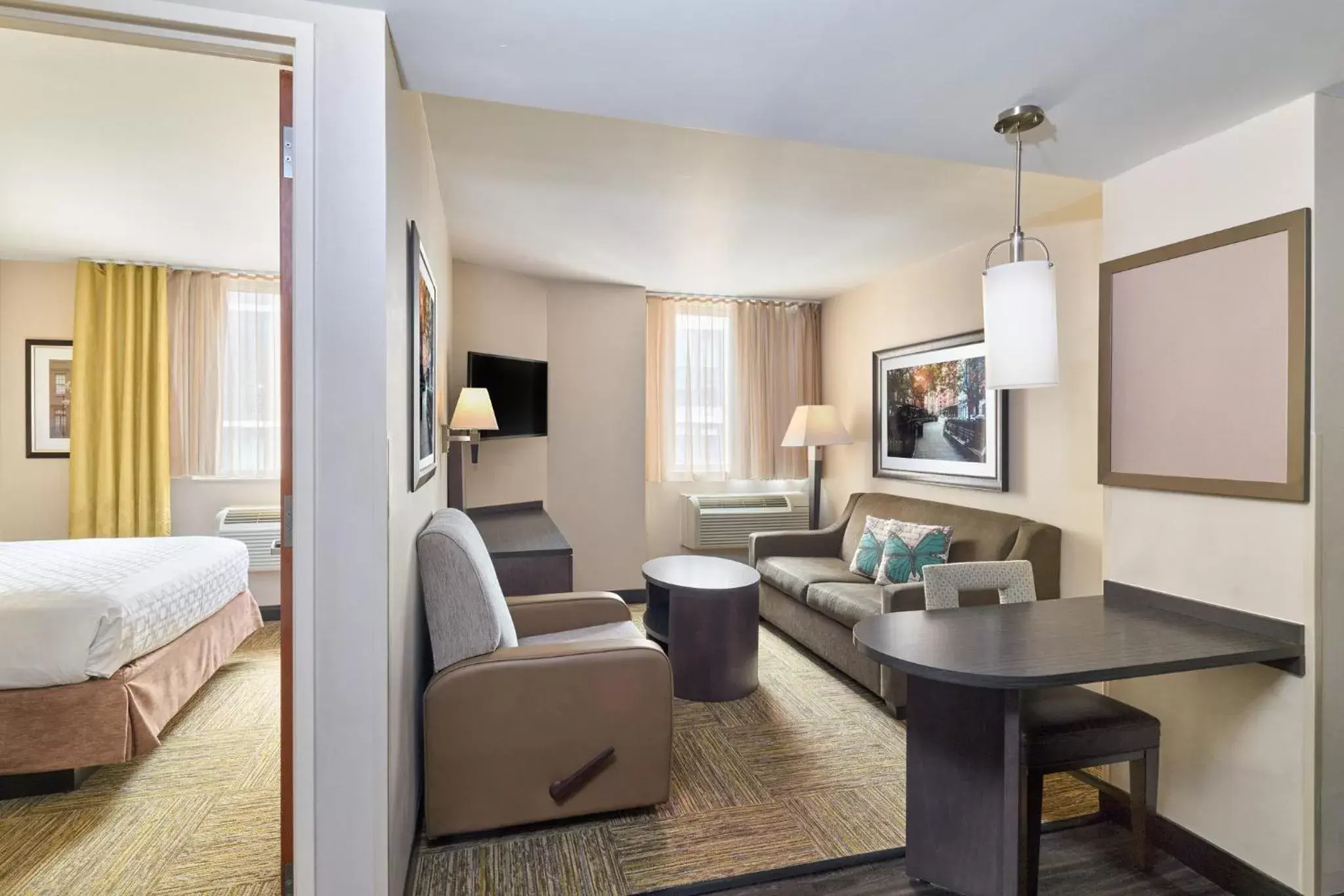 Photo of the whole room, Seating Area in Candlewood Suites NYC -Times Square, an IHG Hotel
