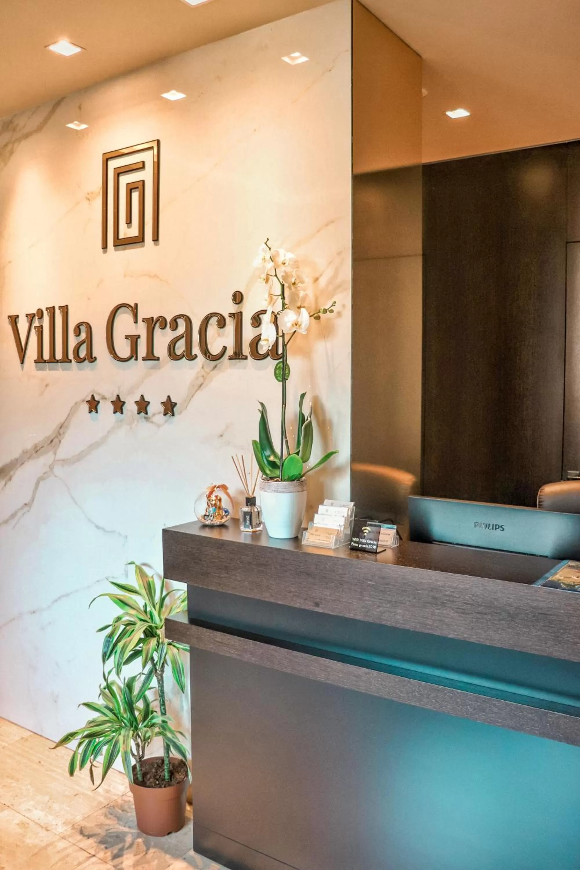 Property logo or sign in Hotel Villa Gracia