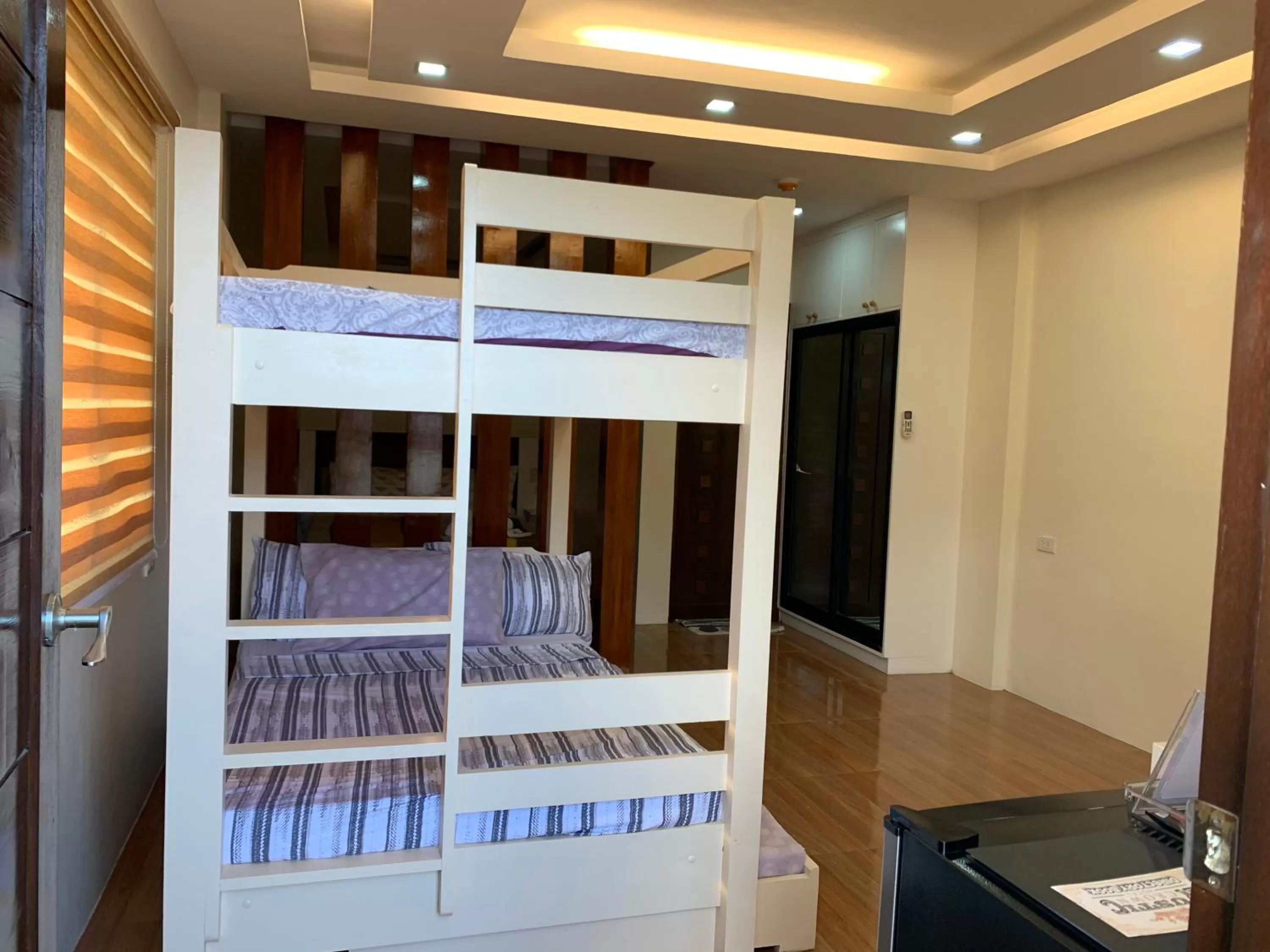 Bed in Rustic Crown Hotel