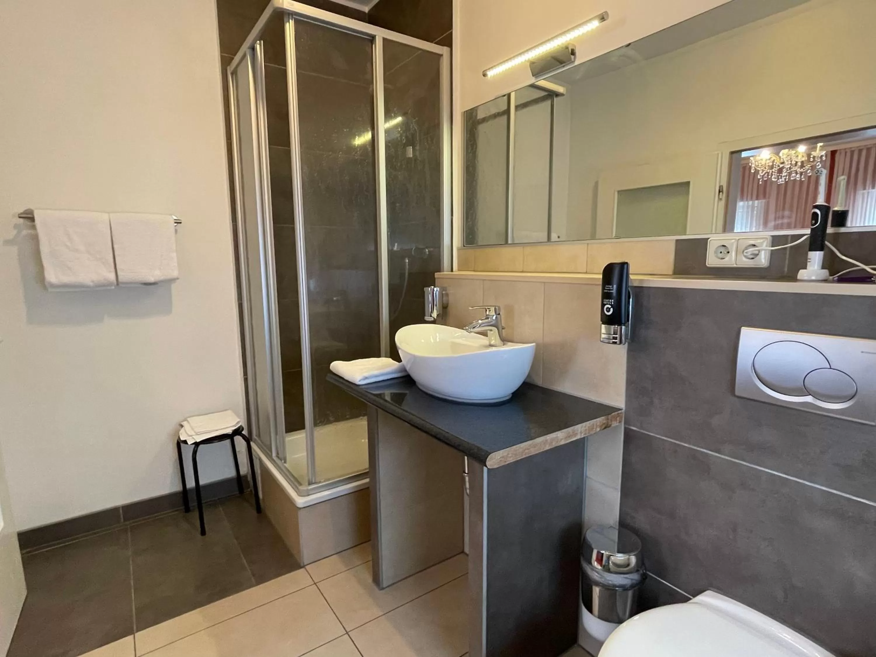 Bathroom in Hafner Hotel- Apartment