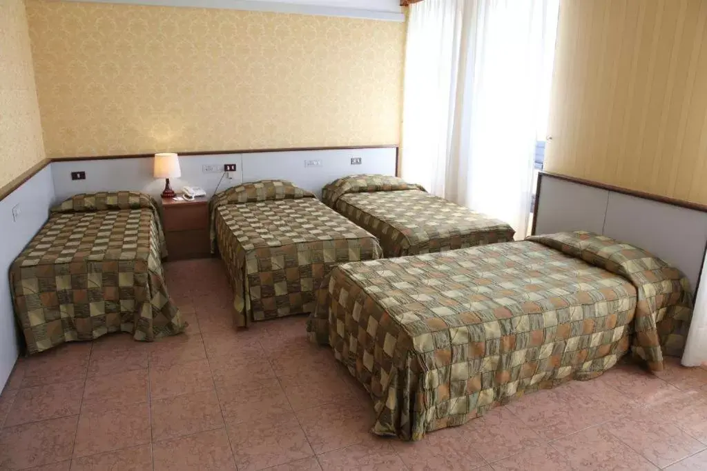Bed in Hotel Maxim