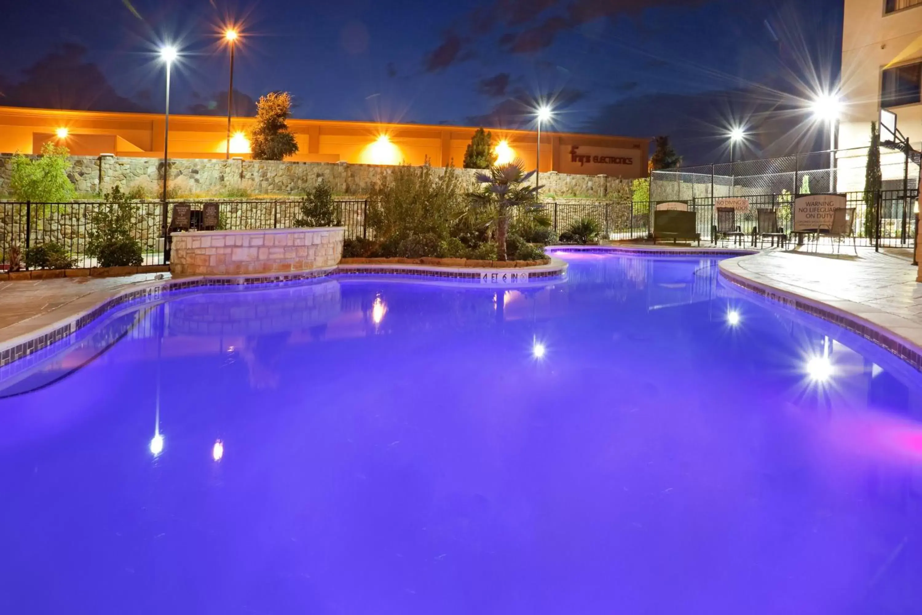 Swimming pool, Property Building in Staybridge Suites DFW Airport North, an IHG Hotel