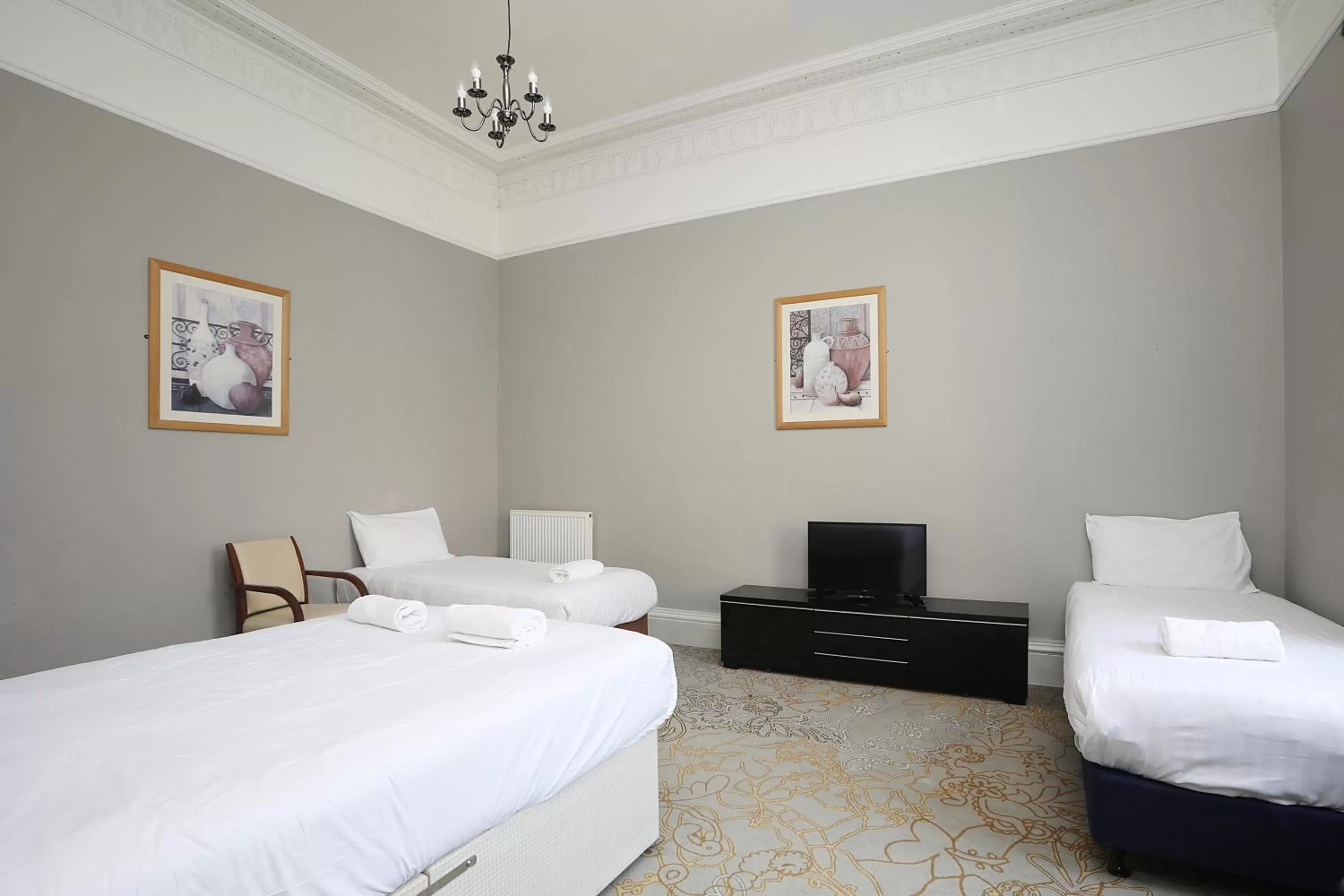 Bed in Cairn Hotel & Apartments