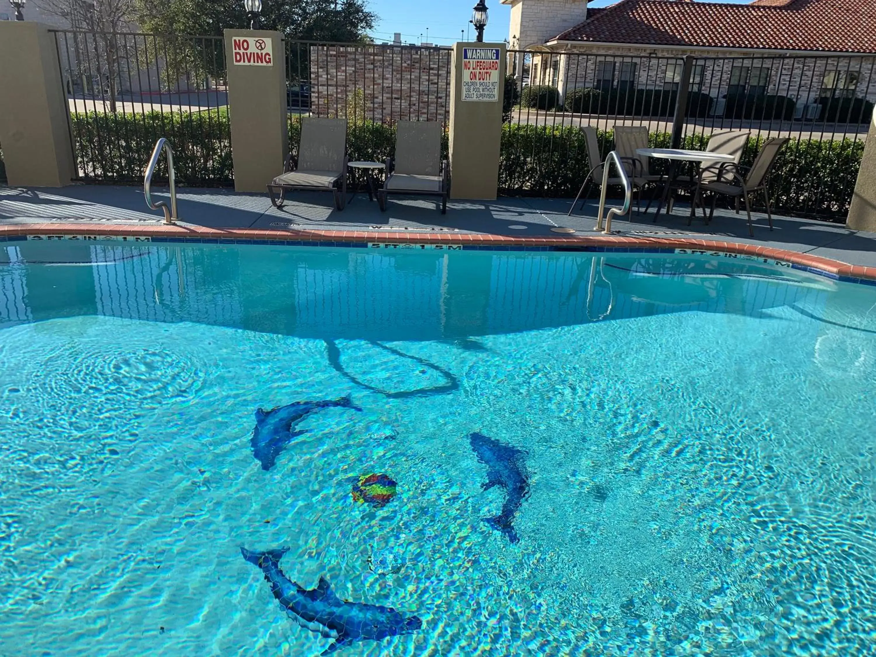 Swimming Pool in SureStay Plus Hotel by Best Western Mesquite