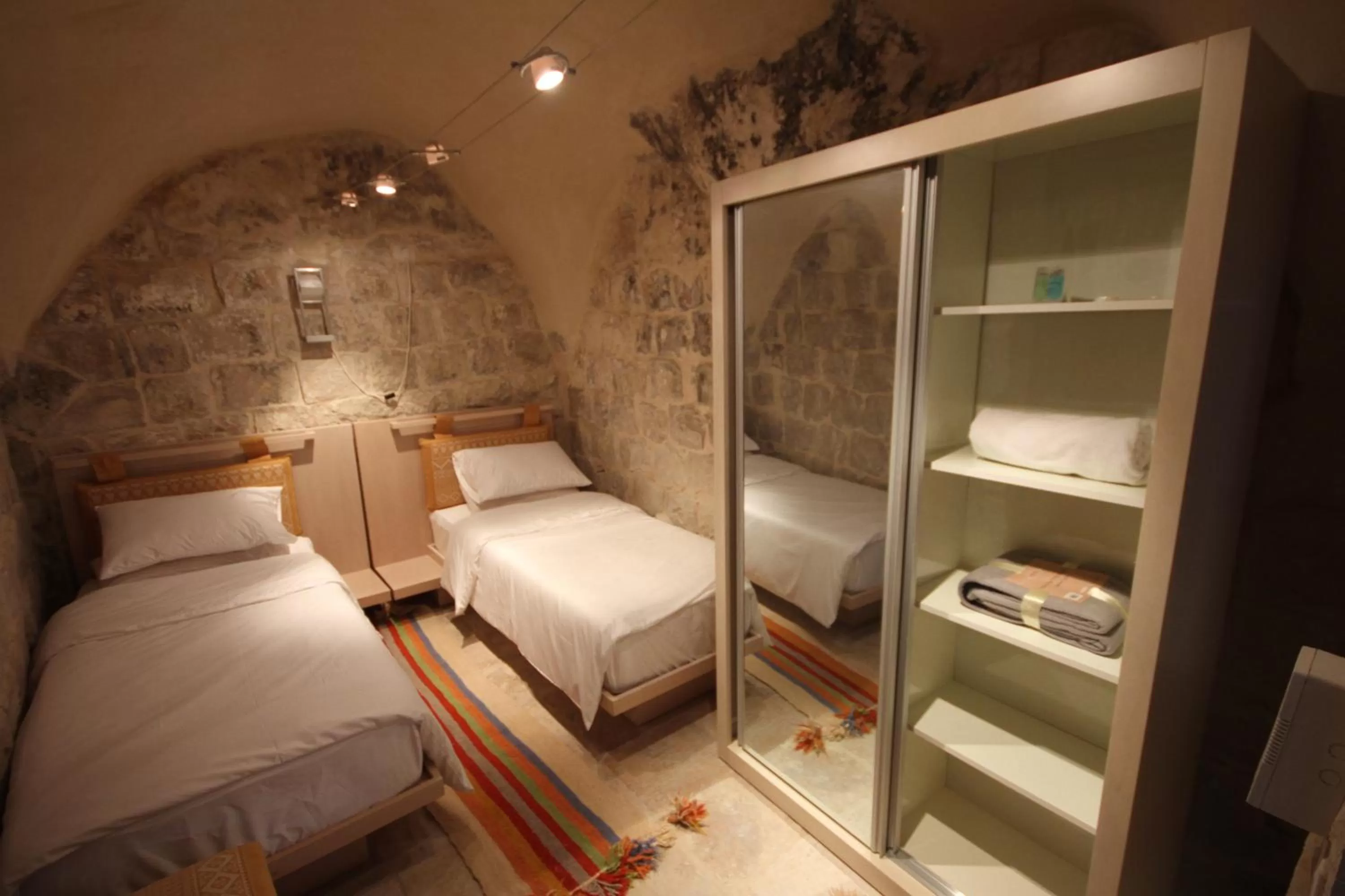 Bed in Khan Alwakala Hotel