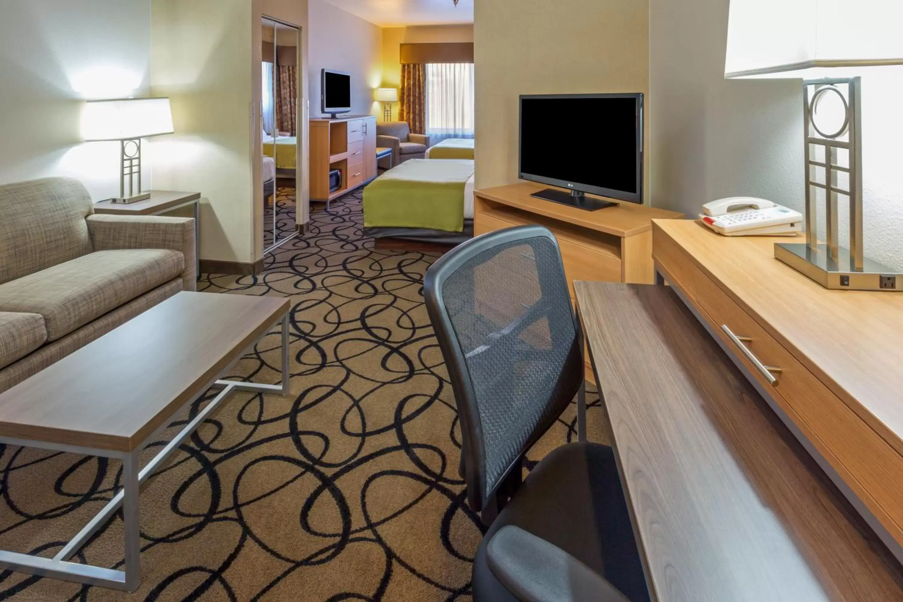 Photo of the whole room, TV/Entertainment Center in Holiday Inn Express Hotel and Suites - Henderson, an IHG Hotel