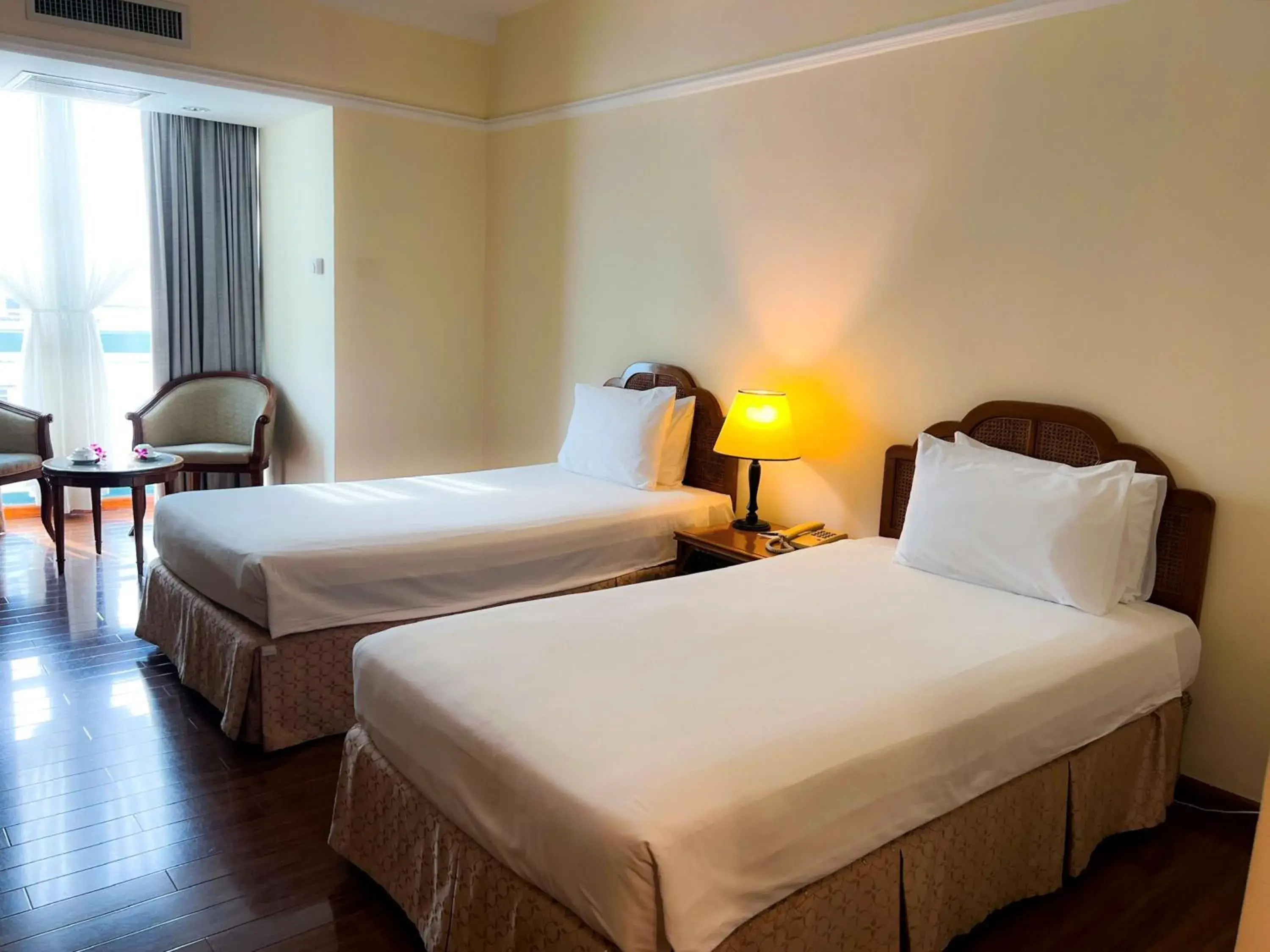 Bed in Ramana Saigon Hotel