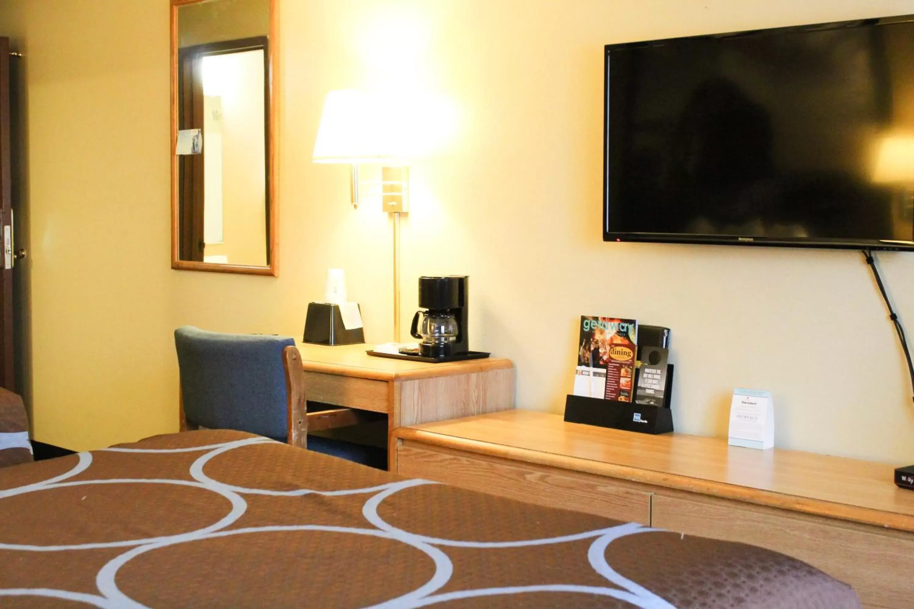 Bed, TV/Entertainment Center in Super 8 by Wyndham Carson City