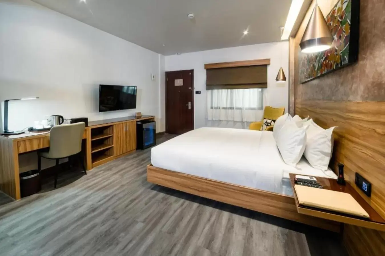 Bed in SureStay Plus Hotel by Best Western AC LUXE Angeles City