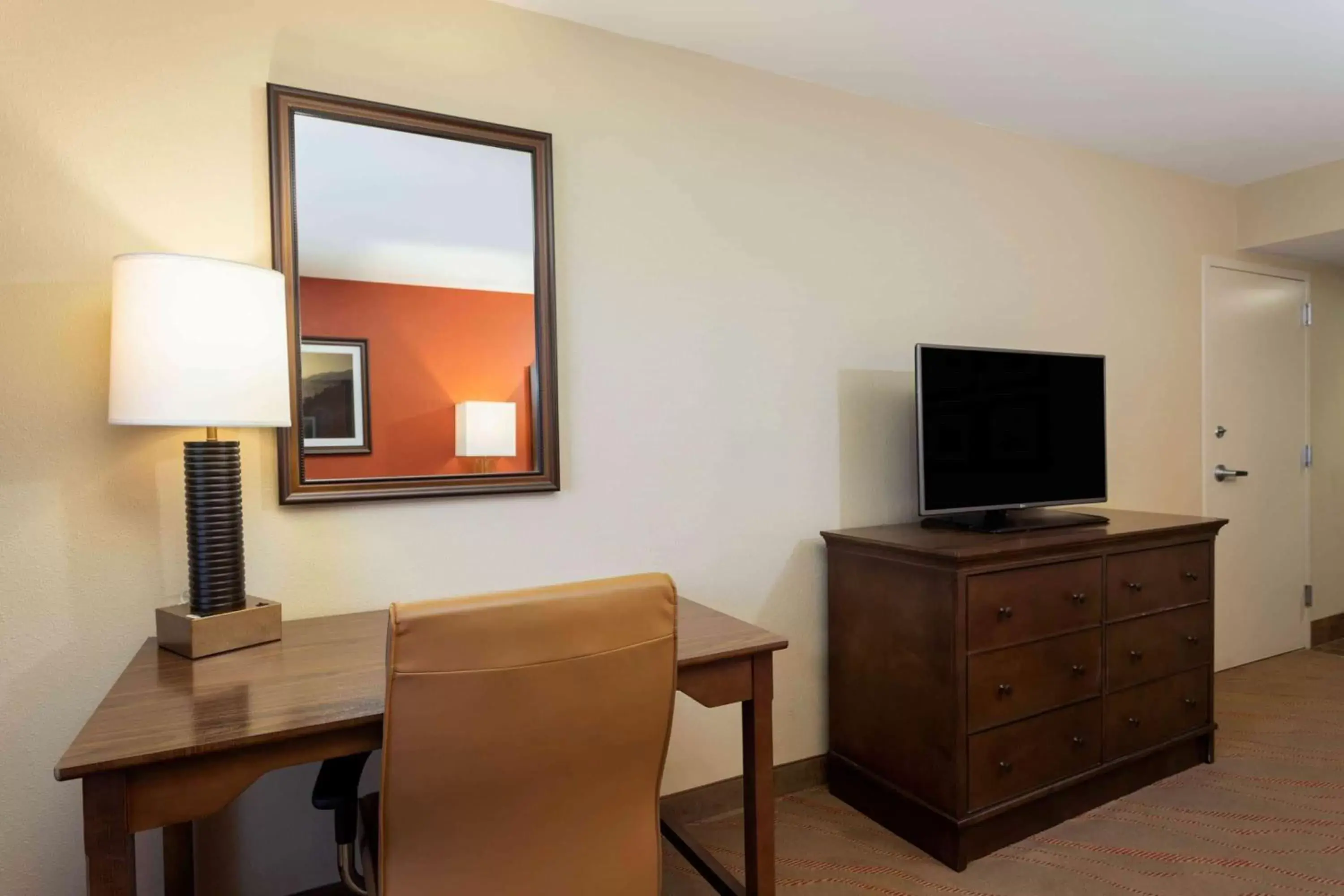 Photo of the whole room, TV/Entertainment Center in La Quinta by Wyndham Pigeon Forge