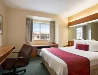 Photo of the whole room, Bed in Days Inn & Suites by Wyndham Lafayette IN