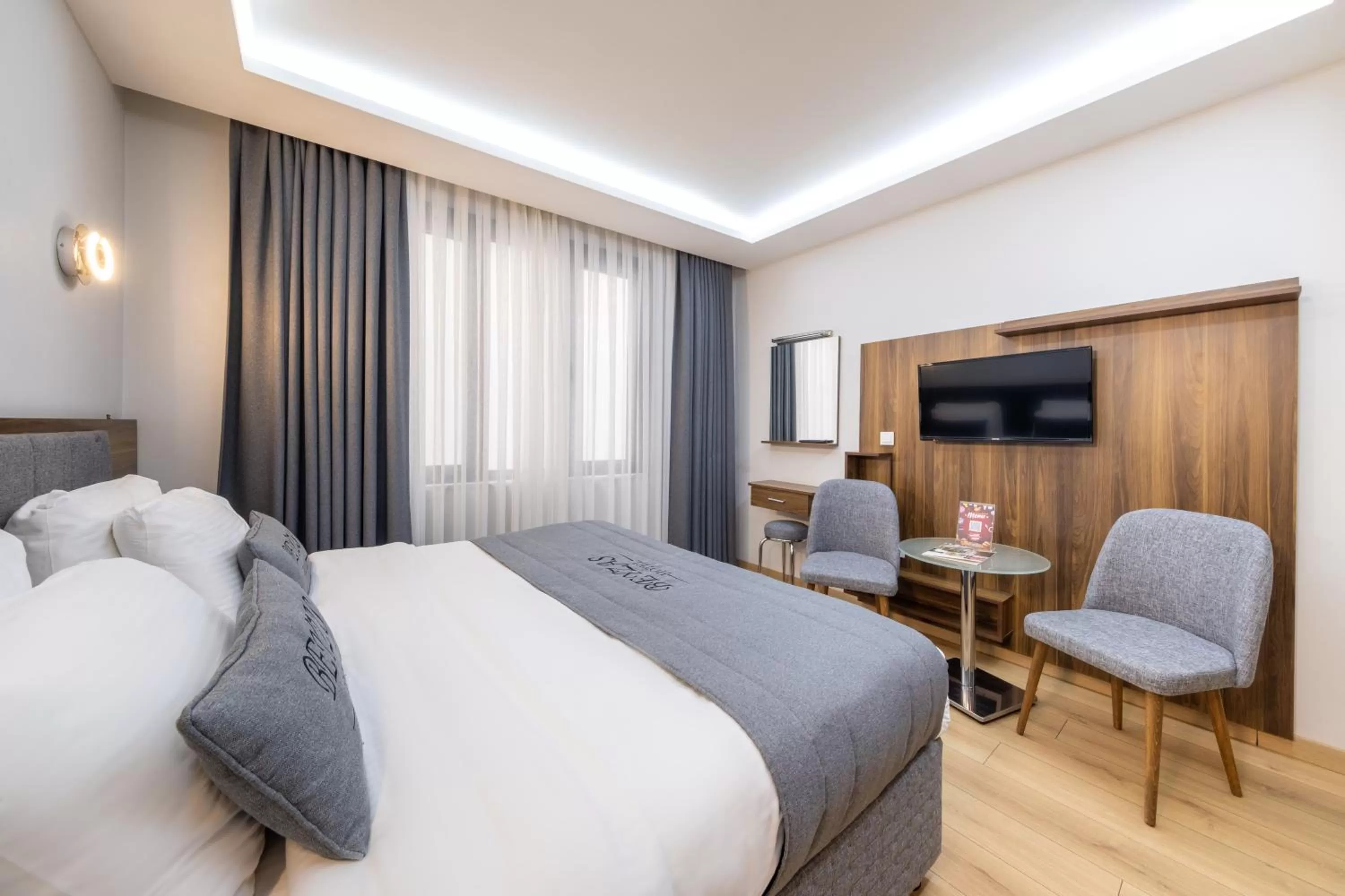 Bed in Beyzas Hotels & Suites