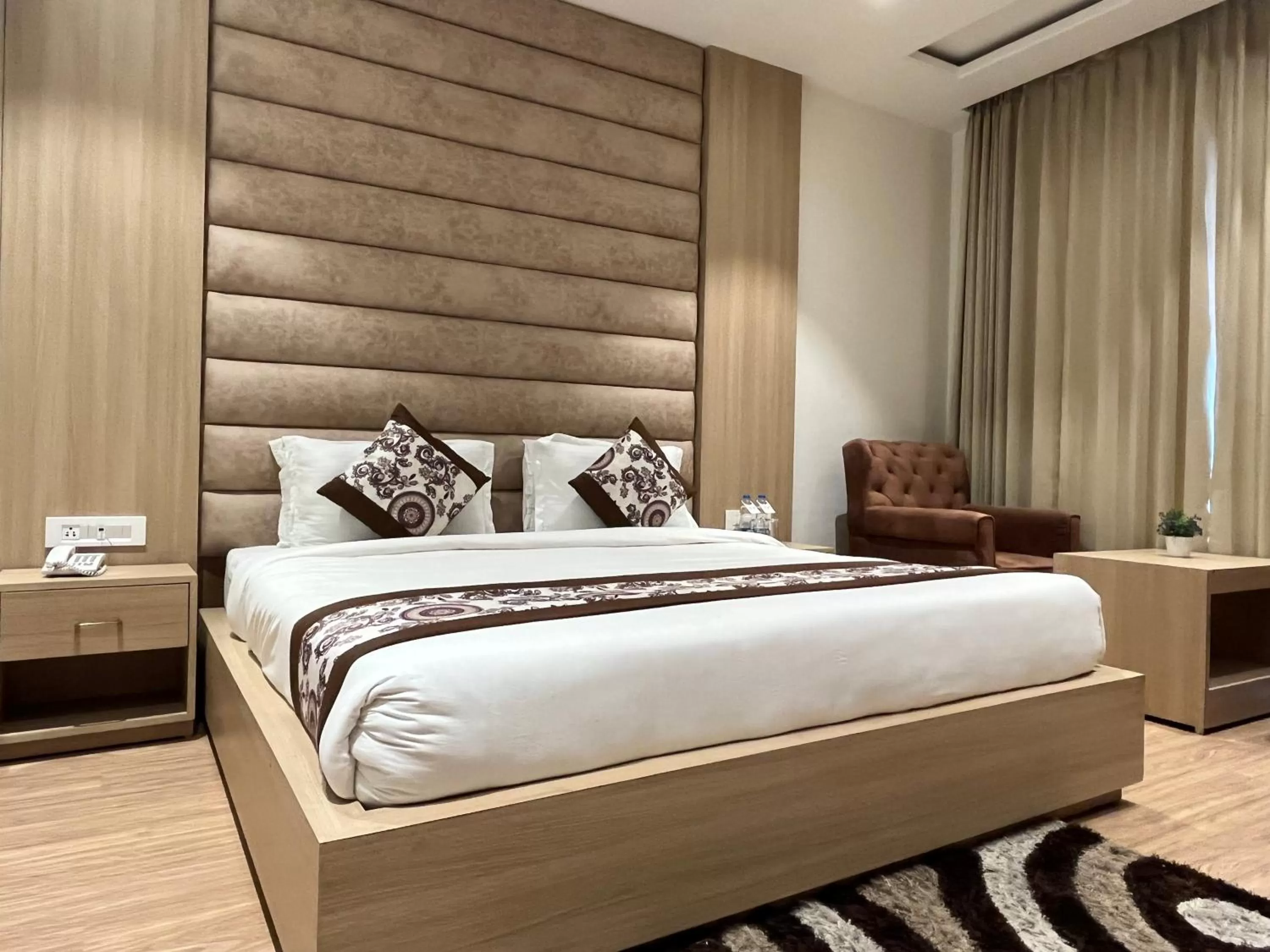 Photo of the whole room, Bed in RRV Hotel