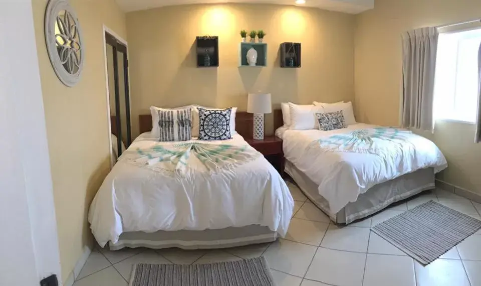 Property building, Bed in Quinta Pacifica Beachfront Villas