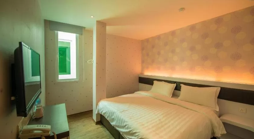 Bed in Riverfront Boutique Hotel