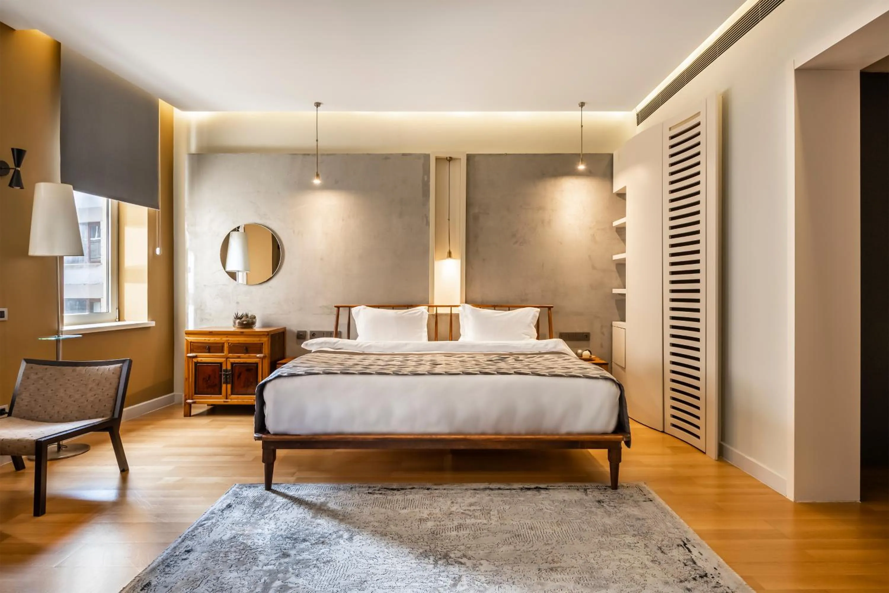 Bed in Ansen Hotel and Suites