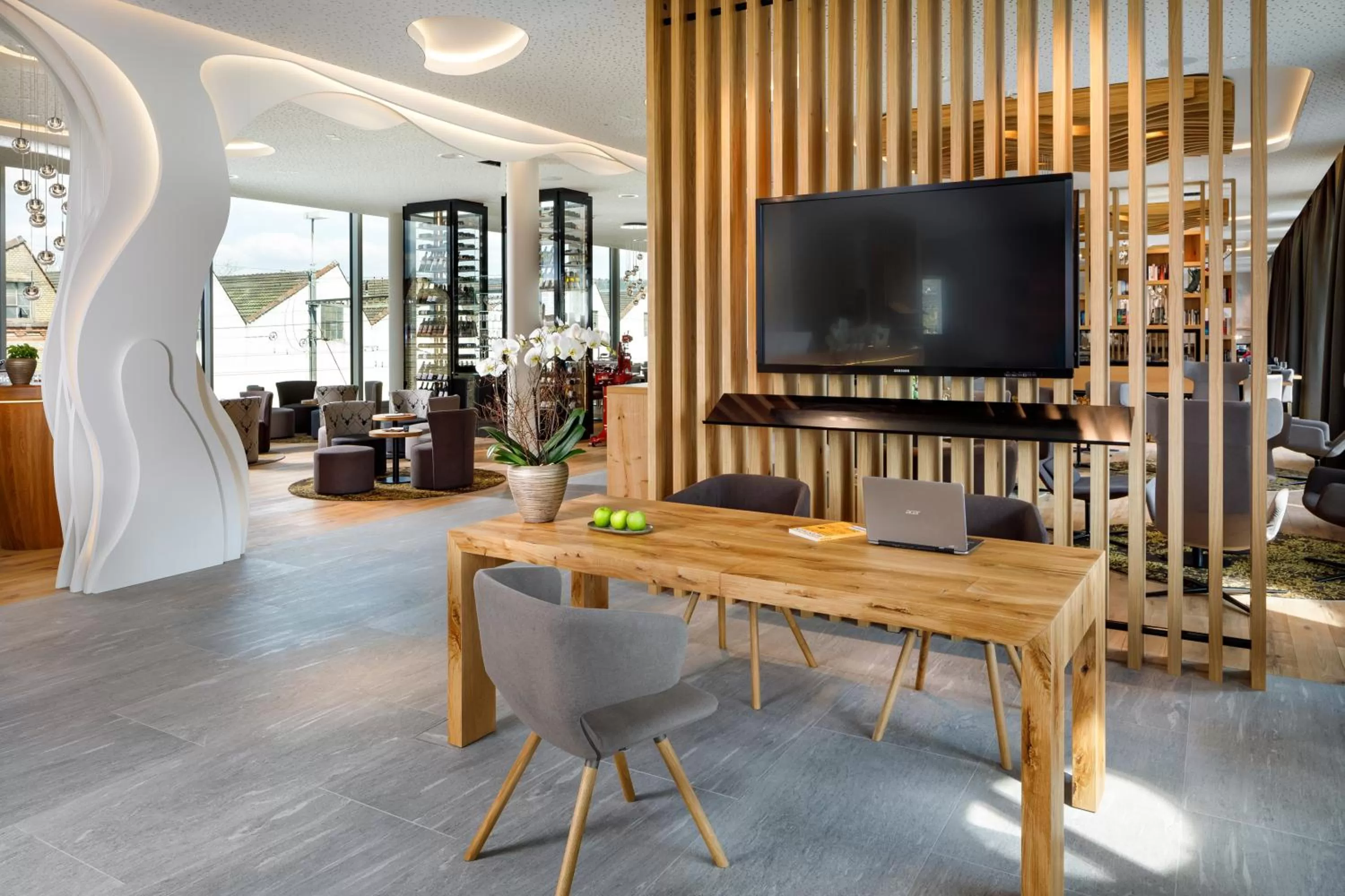 Communal lounge/ TV room in Hotel Allegra Lodge