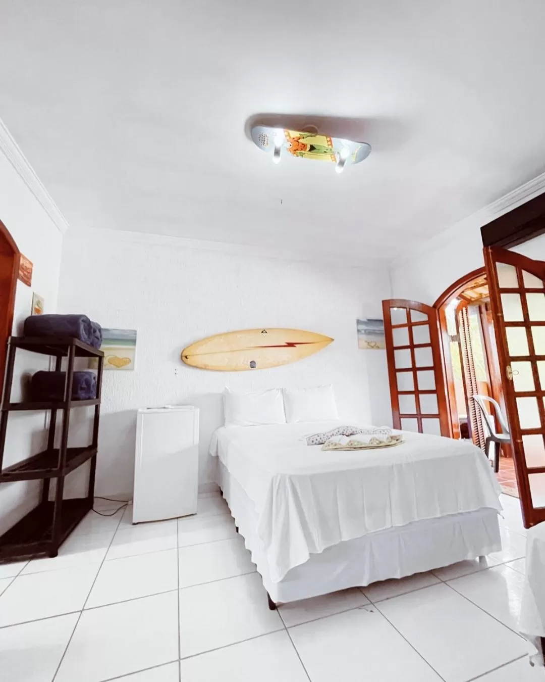 Bed in Pousada Praia do Tombo