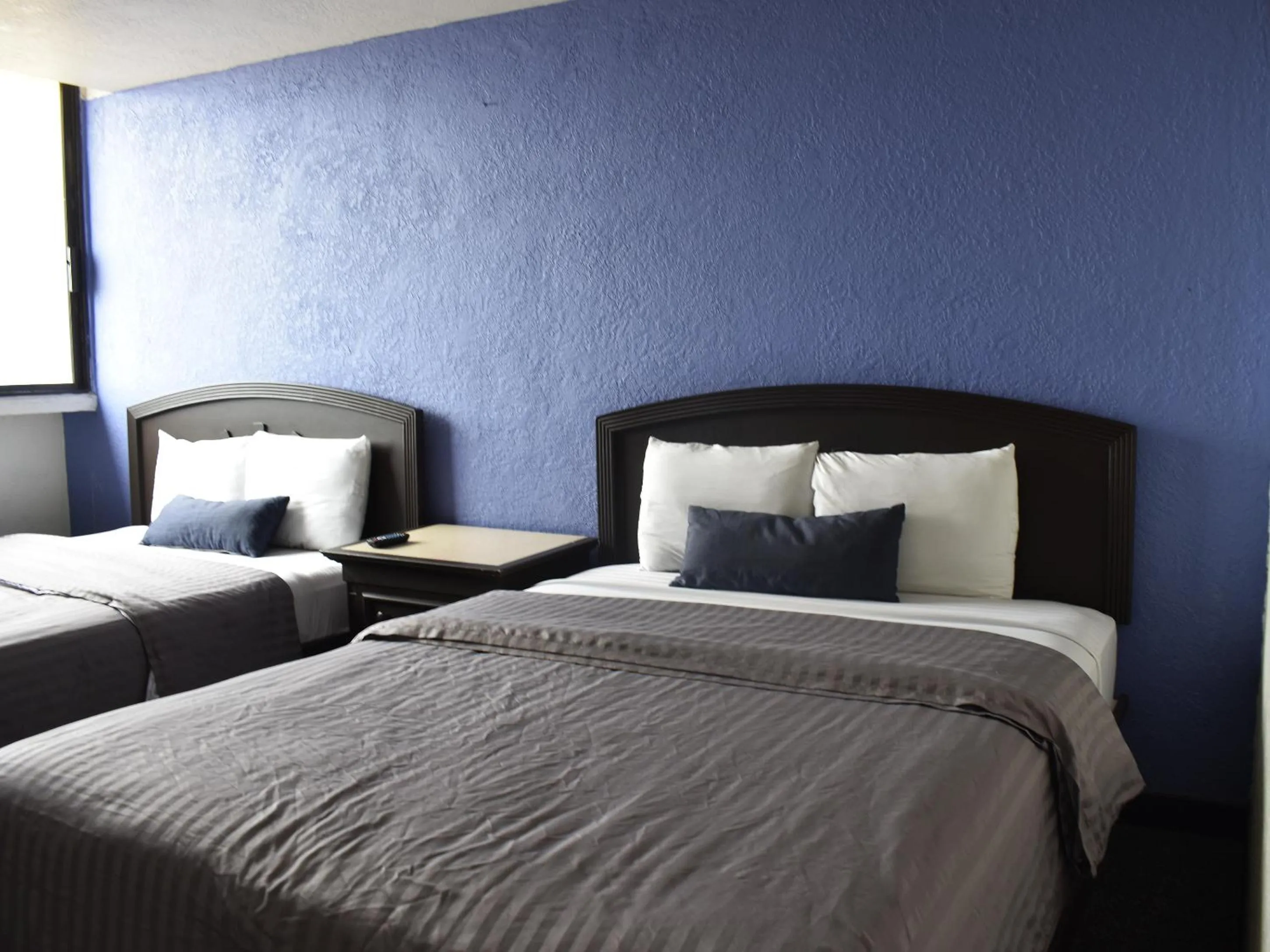 Bedroom in Hotel Corona Plaza