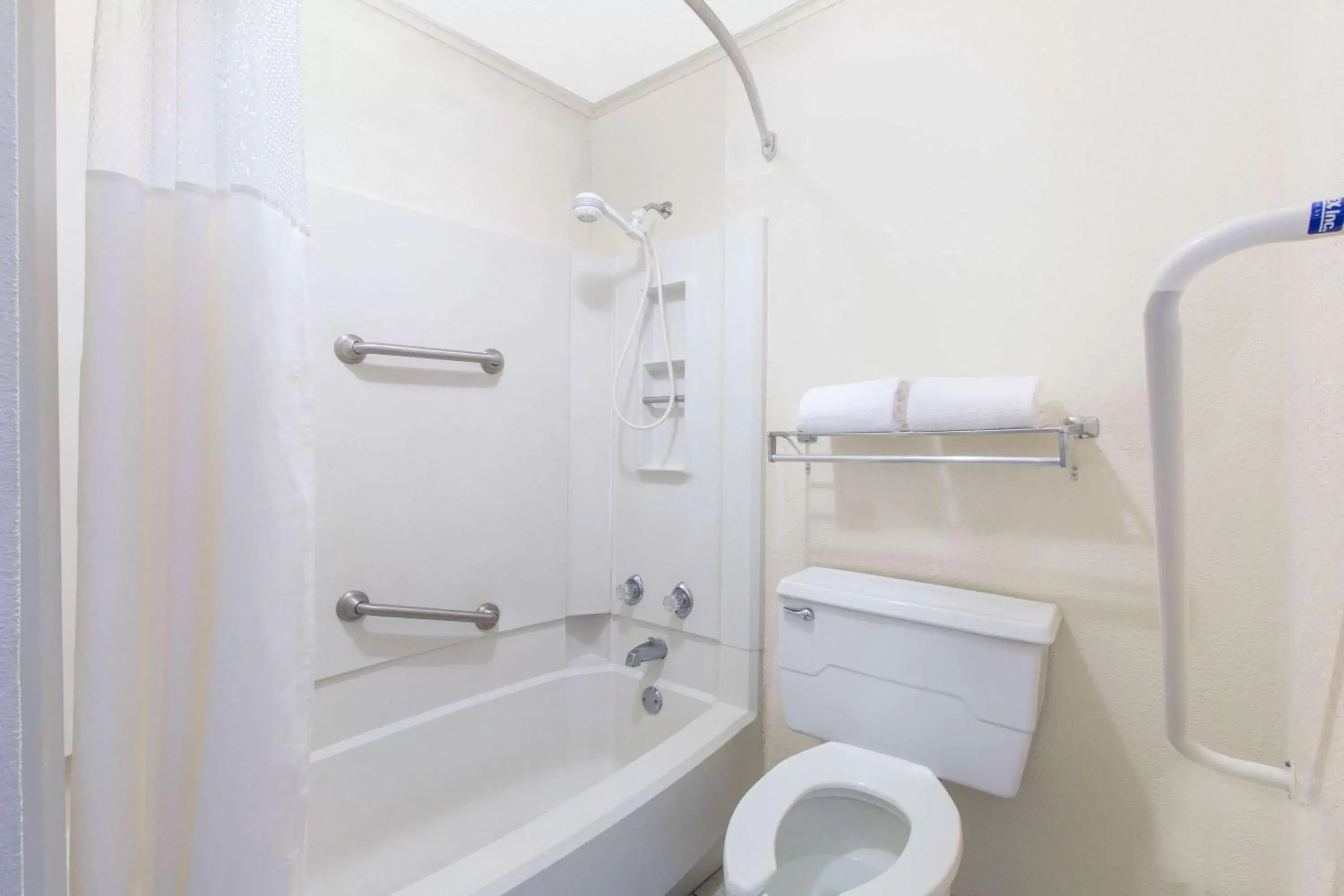 Bathroom in Days Inn & Suites by Wyndham Marshall