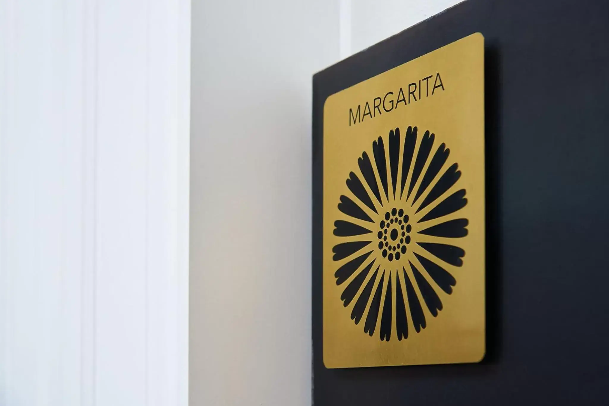 Property logo or sign in Hotel Boutique Margarita Toluca