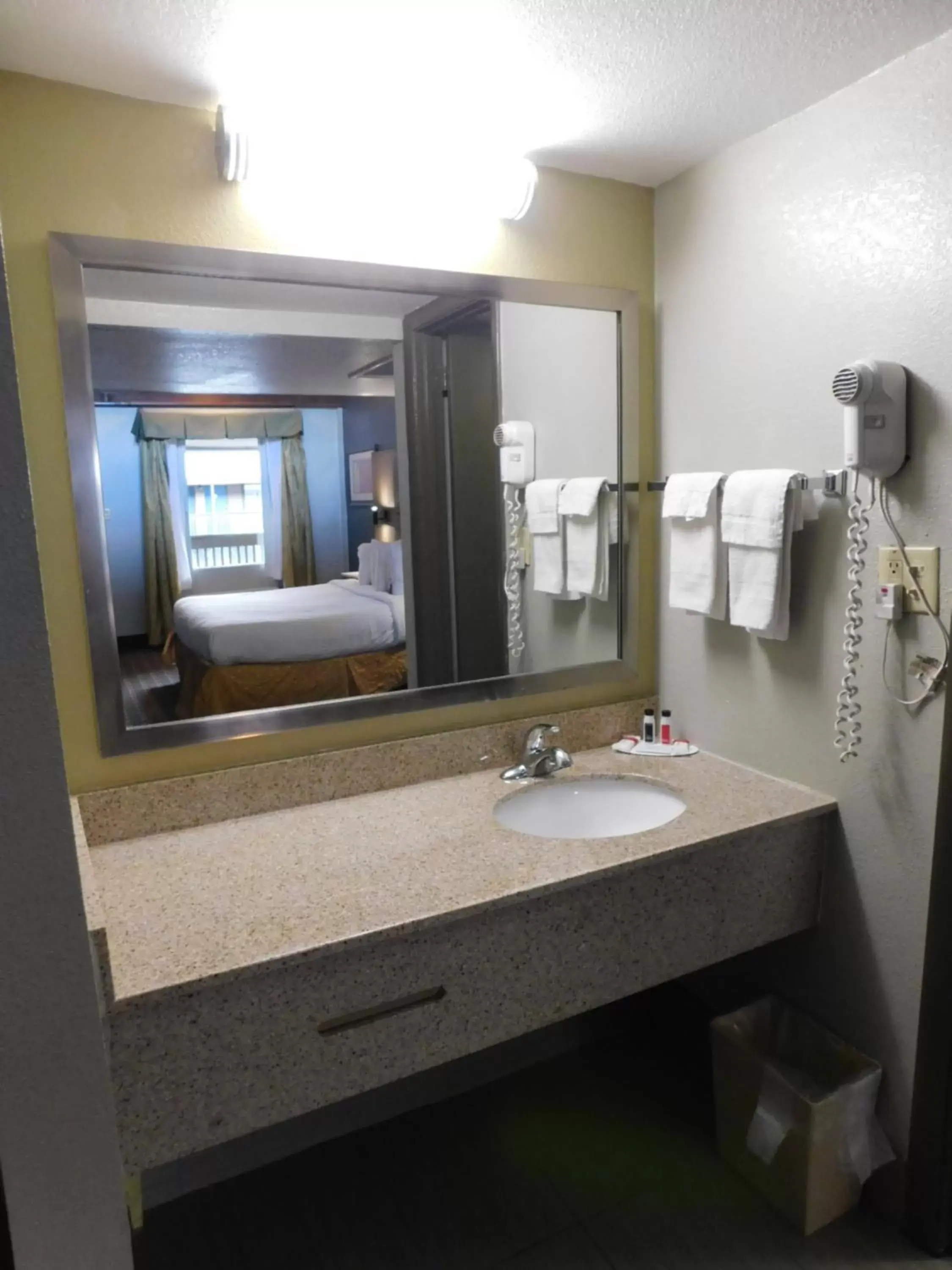 Bathroom in Days Inn & Suites by Wyndham Downtown Gatlinburg Parkway