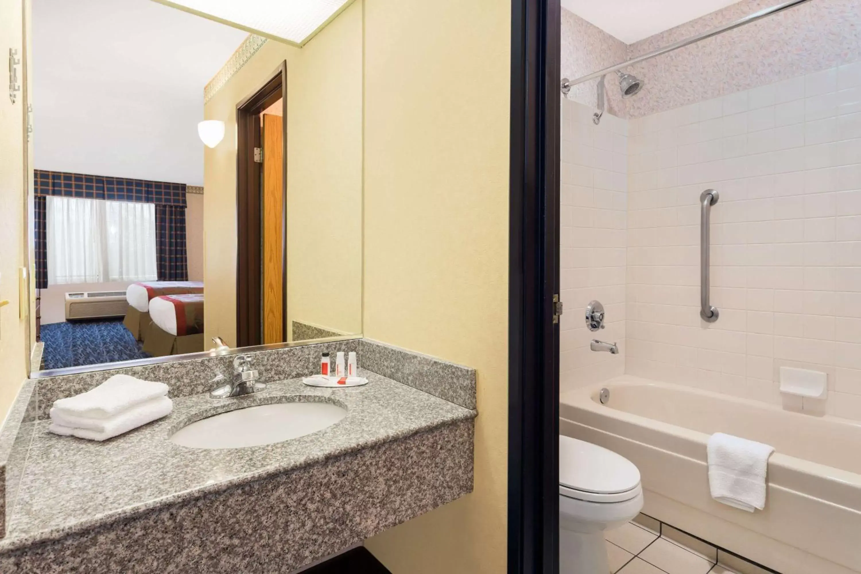 Bathroom in Ramada by Wyndham Kent Seattle Area