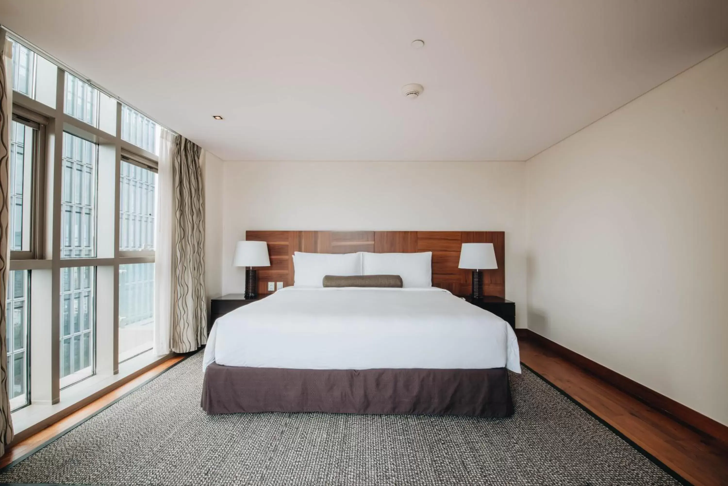 Bed in InterContinental Residences Saigon, an IHG Hotel Bed in InterContinental Residences Saigon, an IHG Hotel