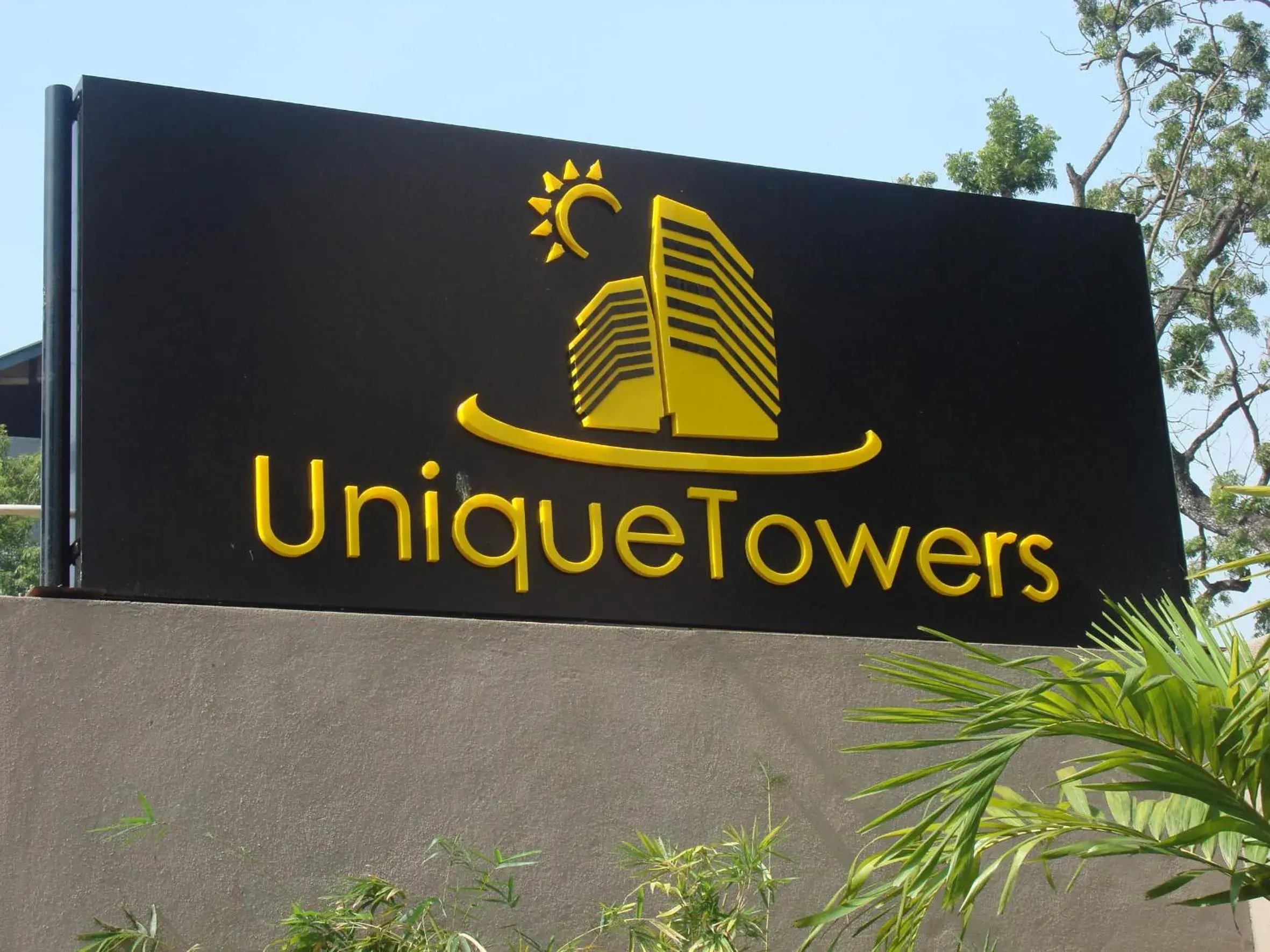 Facade/entrance, Property Logo/Sign in Unique Towers Luxury Boutique Suites