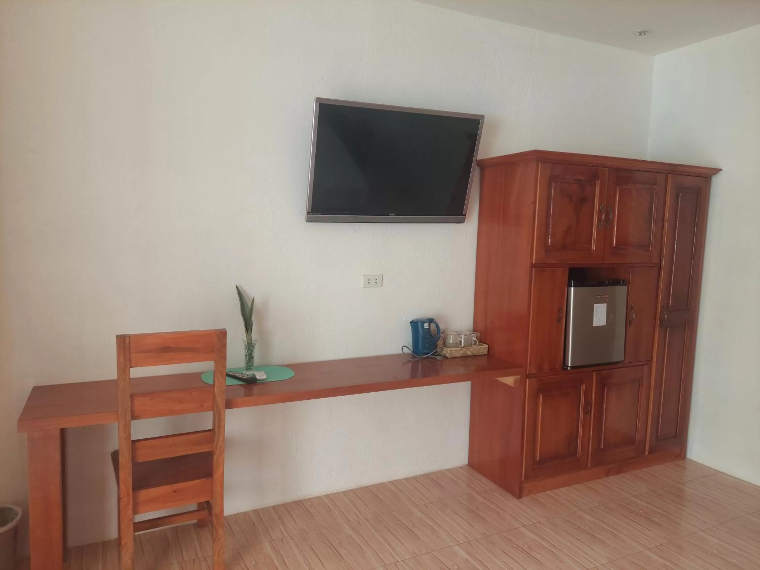 TV and multimedia, TV/Entertainment Center in Becano Restobar and Resort