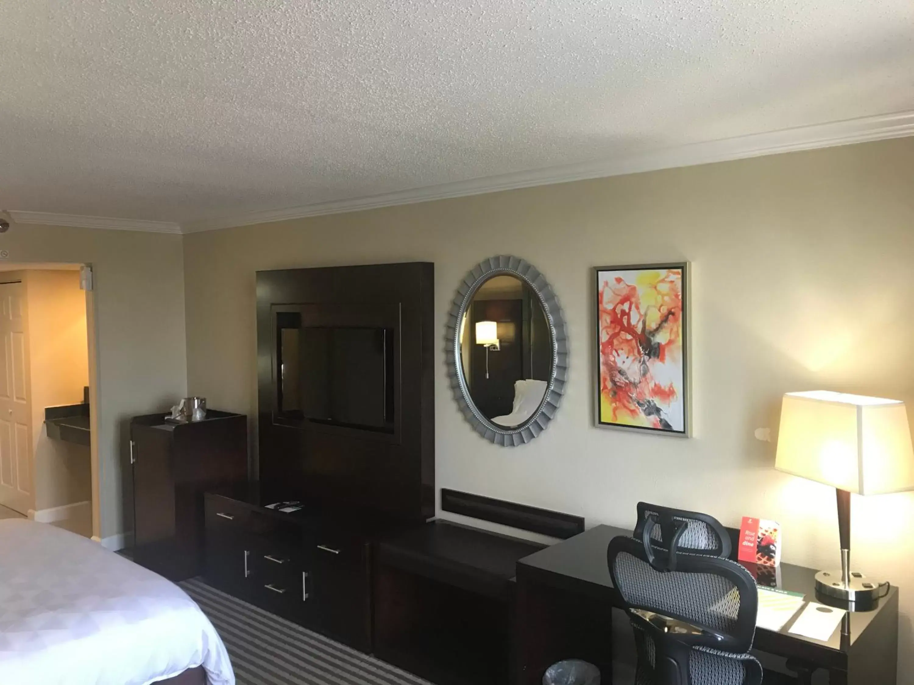 TV and multimedia, TV/Entertainment Center in Holiday Inn Orlando East-UCF Area, an IHG Hotel