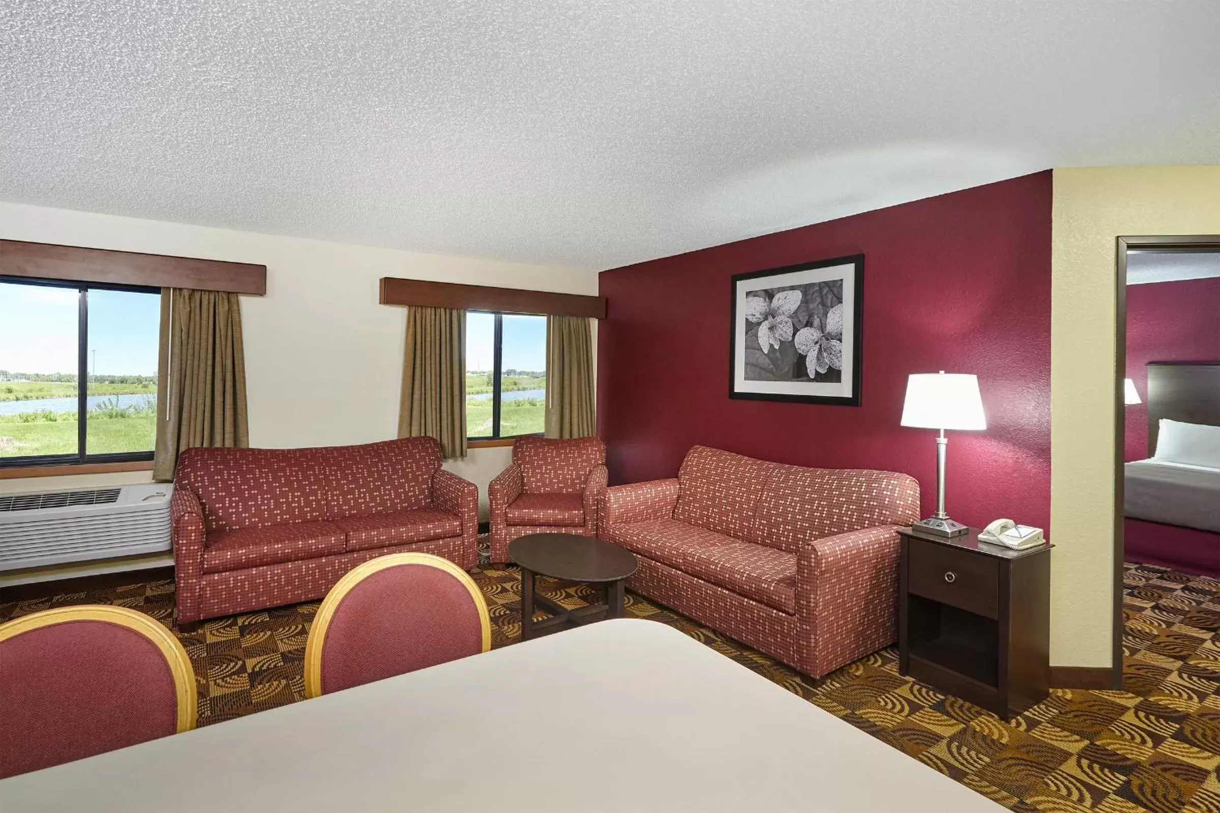 Photo of the whole room, Seating Area in AmericInn by Wyndham Elkhorn Near Lake Geneva