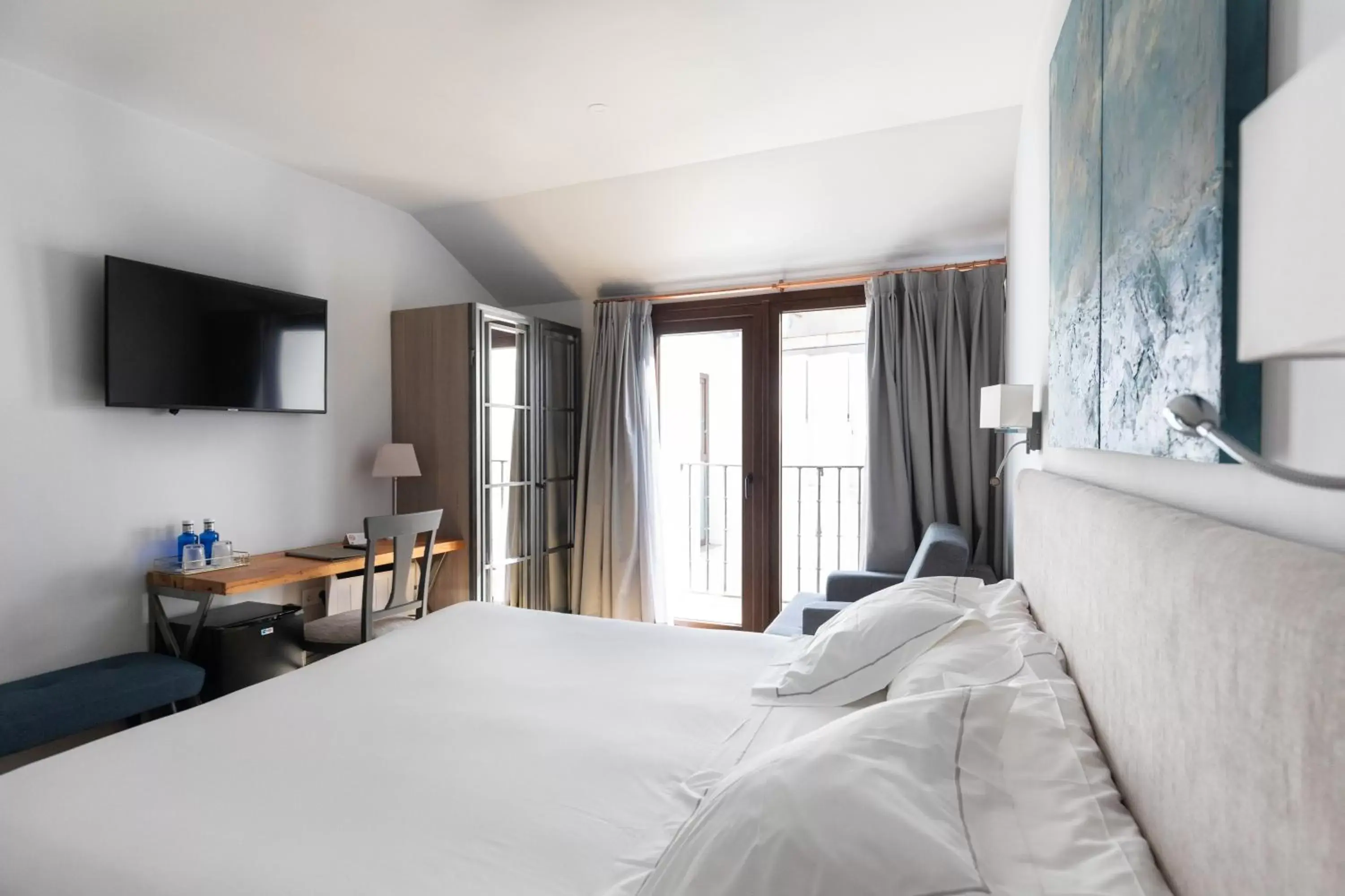 TV and multimedia, Bed in Hospedium Hotel Posada de la Silleria