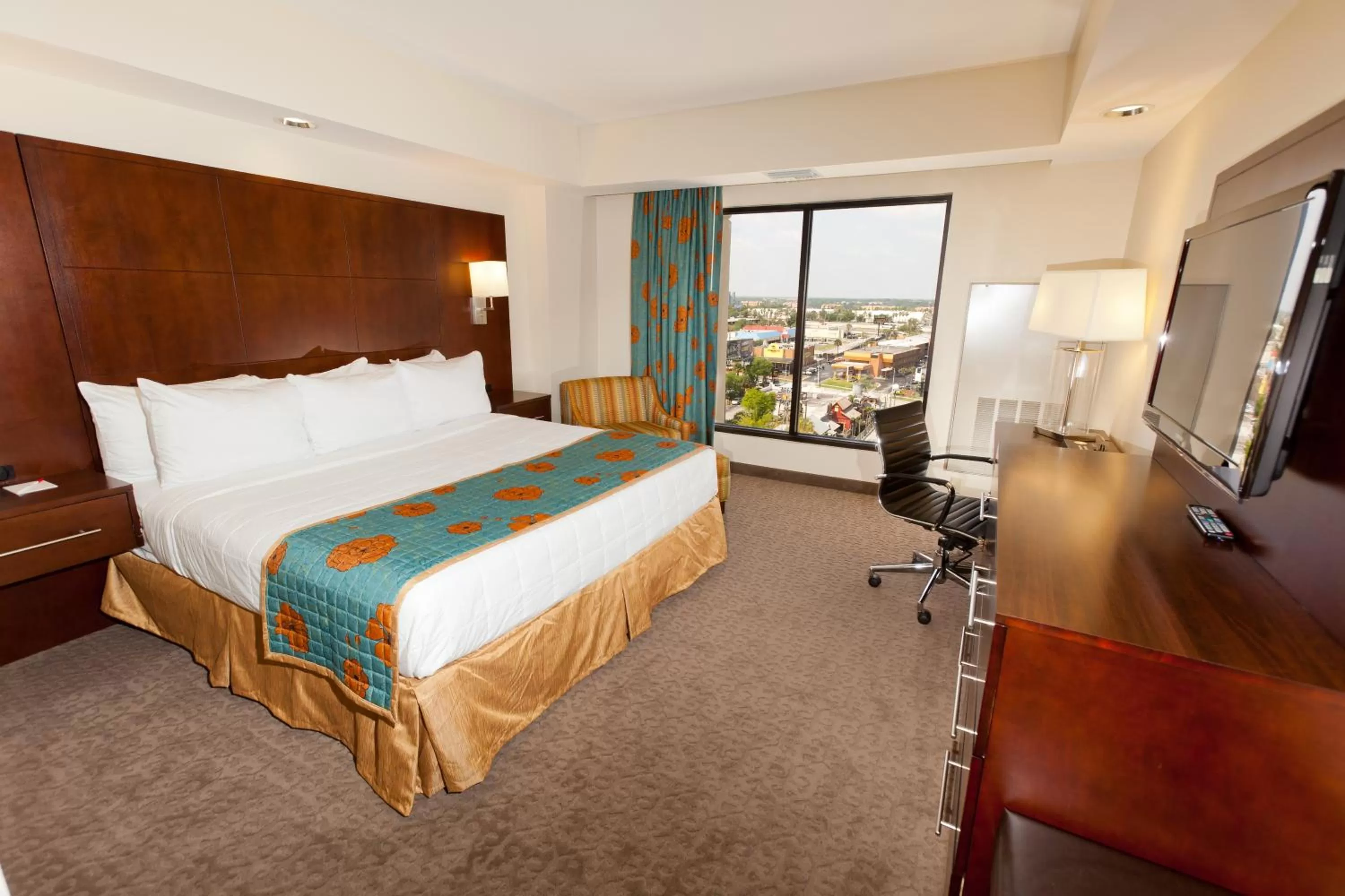 Bed in Ramada Suites By Wyndham Orlando International Drive
