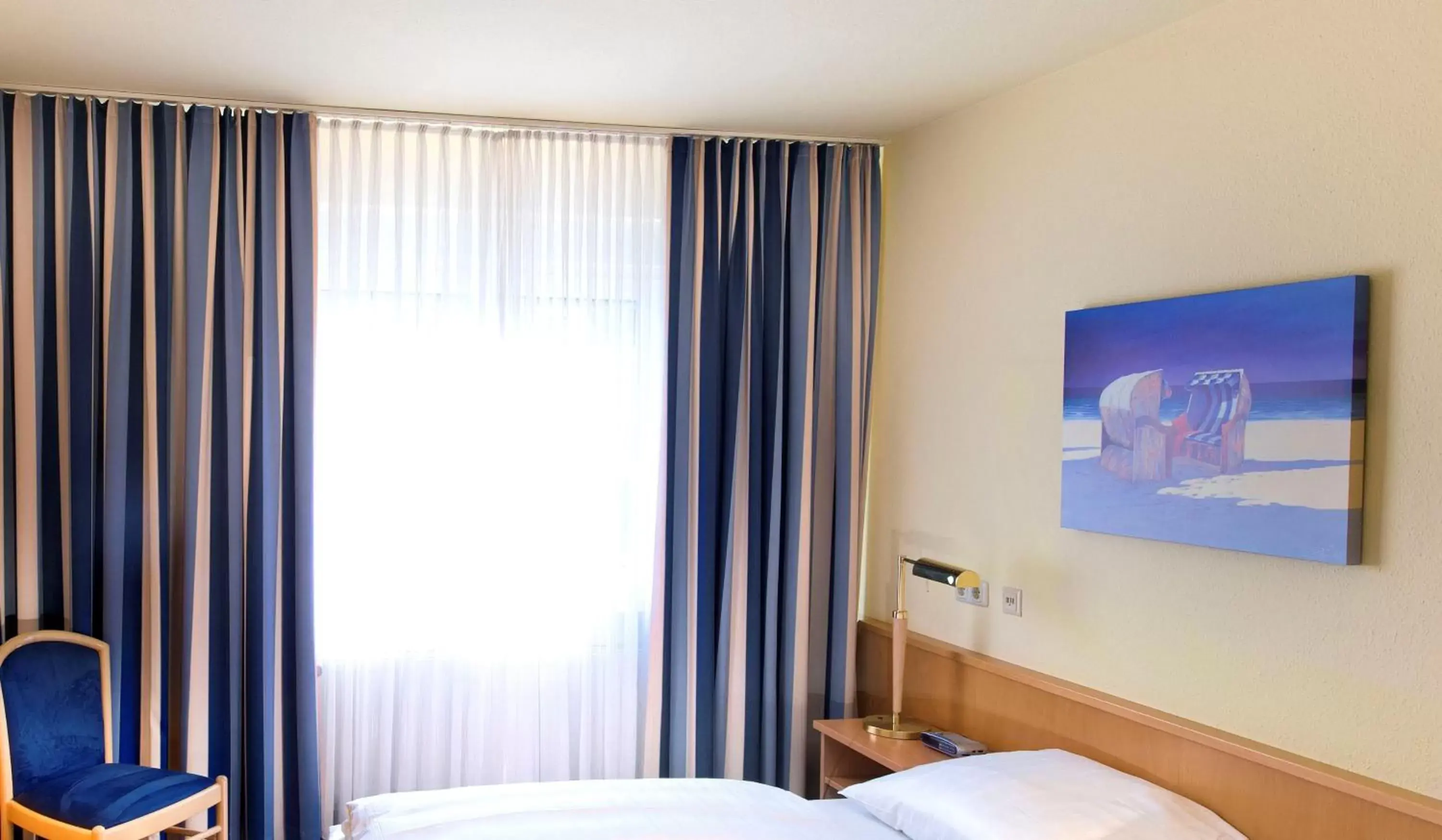 Photo of the whole room, Bed in Tryp by Wyndham Luebeck Aquamarin