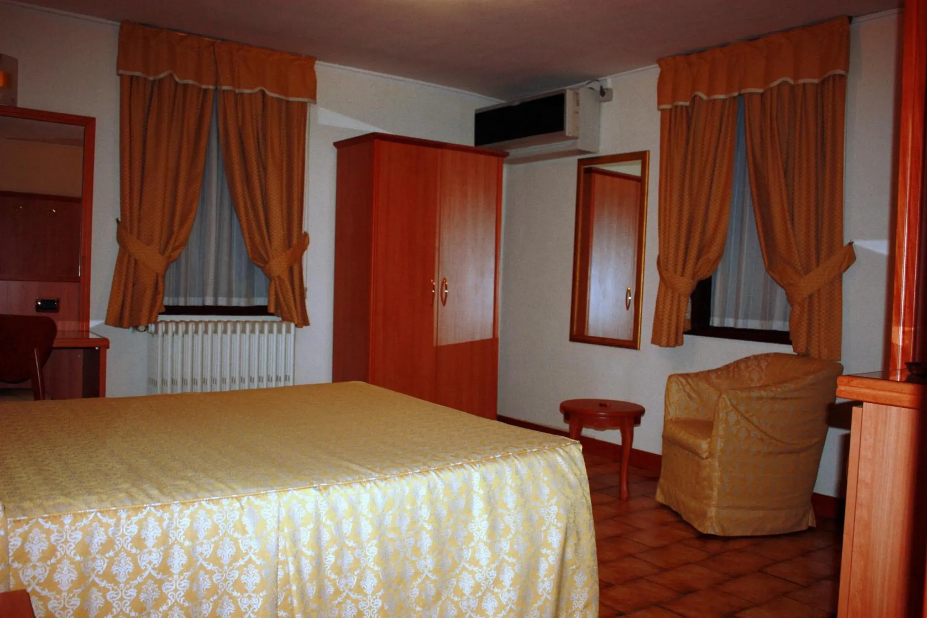 Bed in Piccolo Hotel