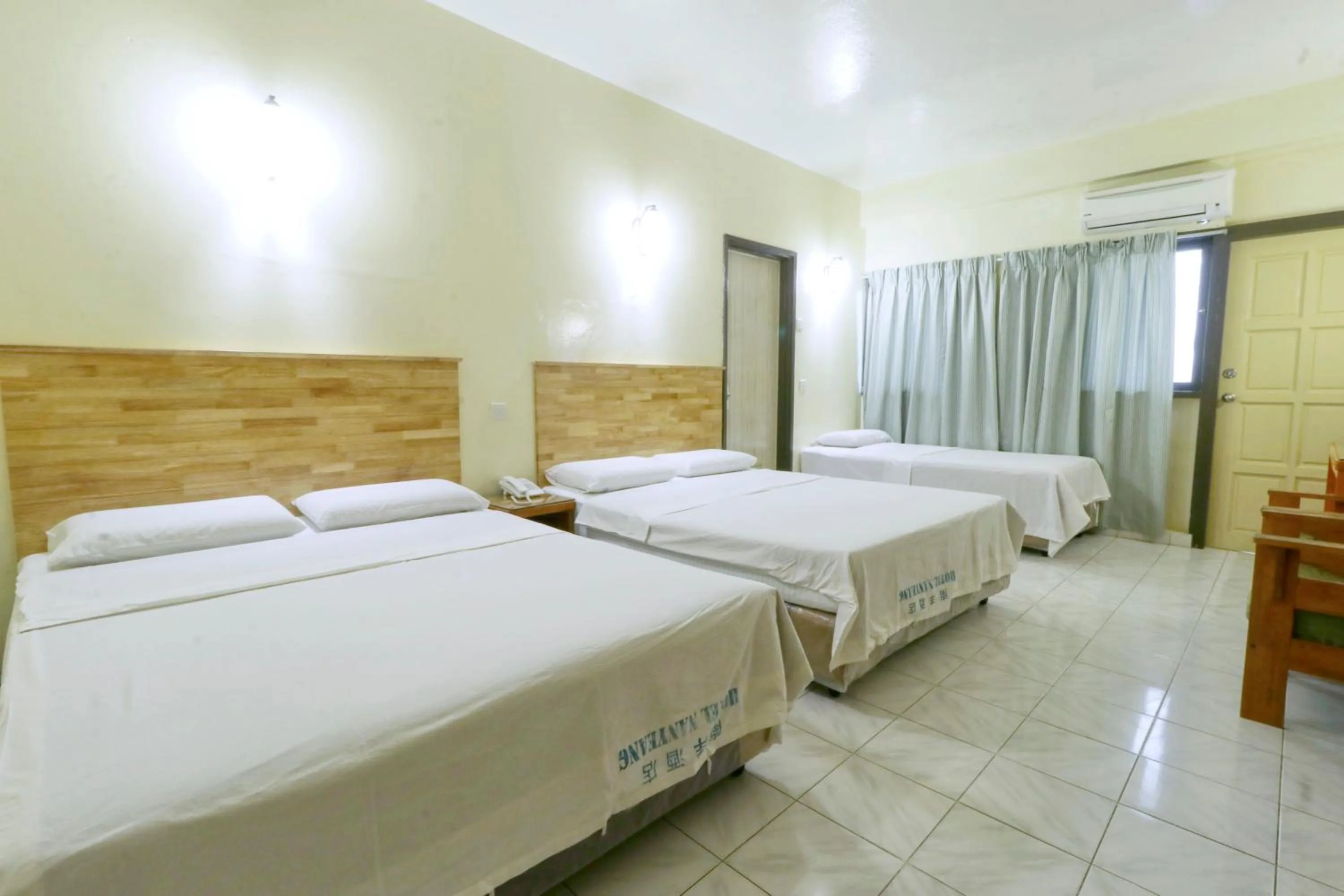 Bed in Nan Yeang Hotel Petaling Street