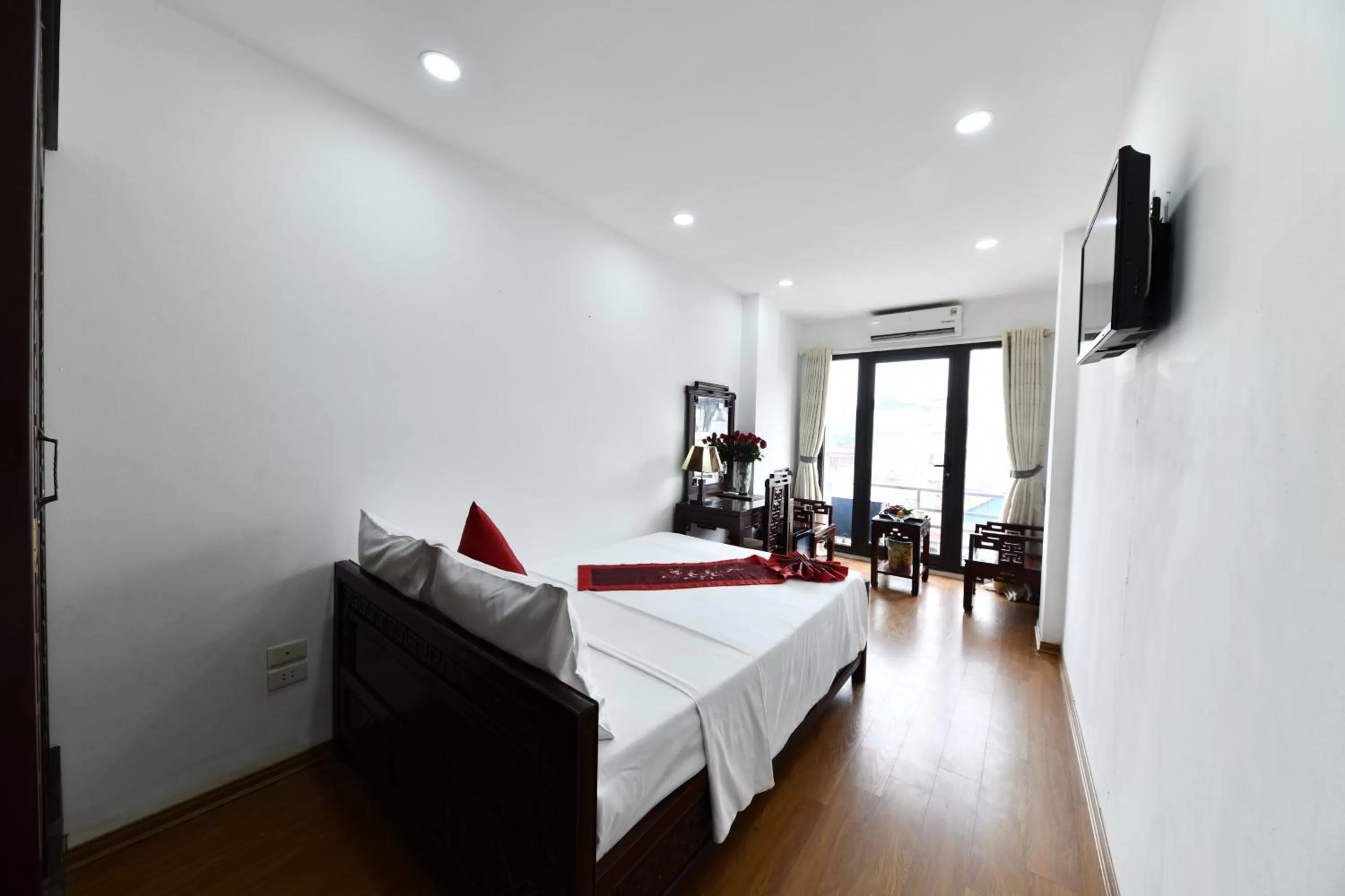 Bed in Phoenix Legend Hotel Hanoi