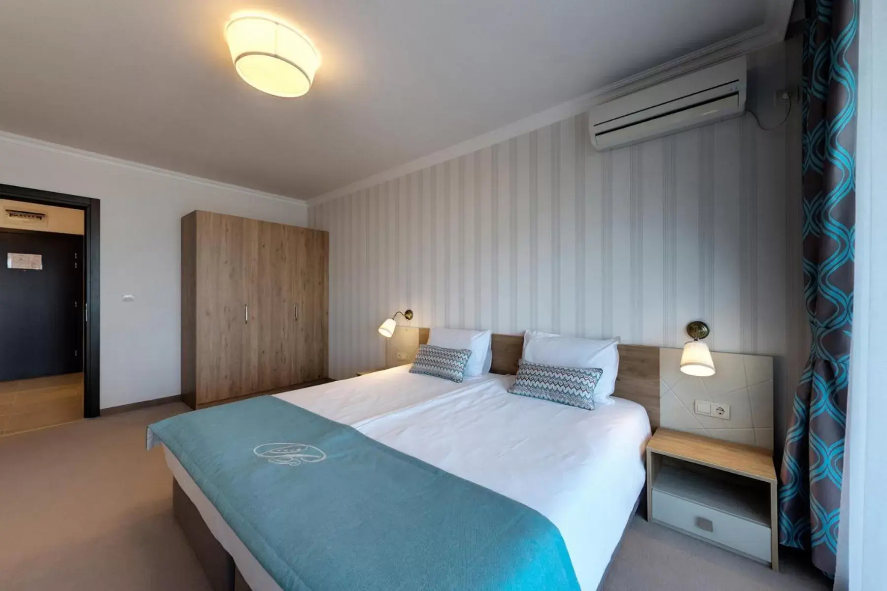 Bed in Penelopa Palace Apart Hotel & SPA Bed in Penelopa Palace Apart Hotel & SPA