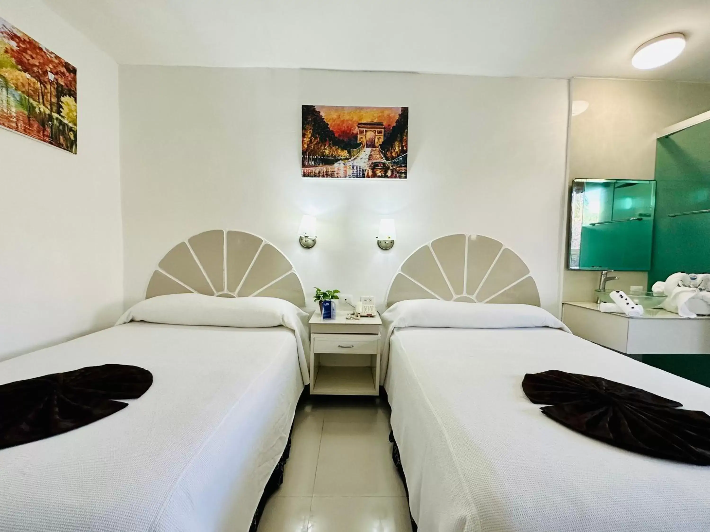 Bed in Hotel Plaza Caribe