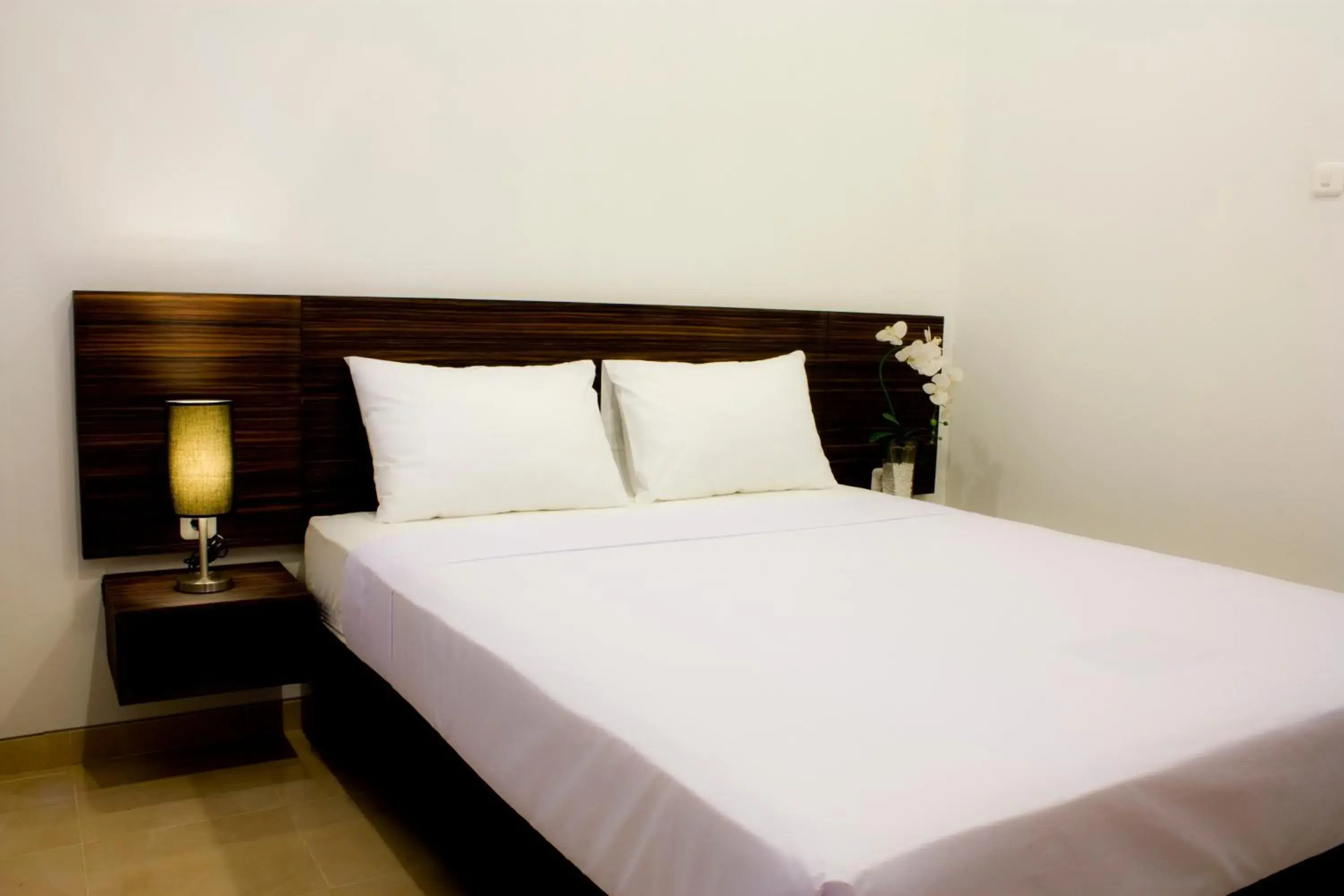 Bed in Grand Marto Hotel