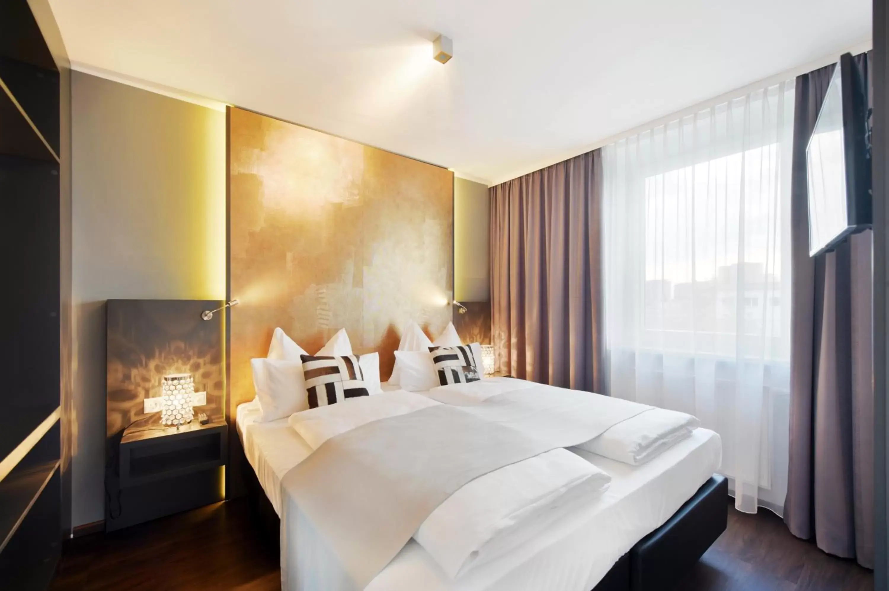 Bed in Amedia Luxury Suites Graz, Trademark Collection by Wyndham