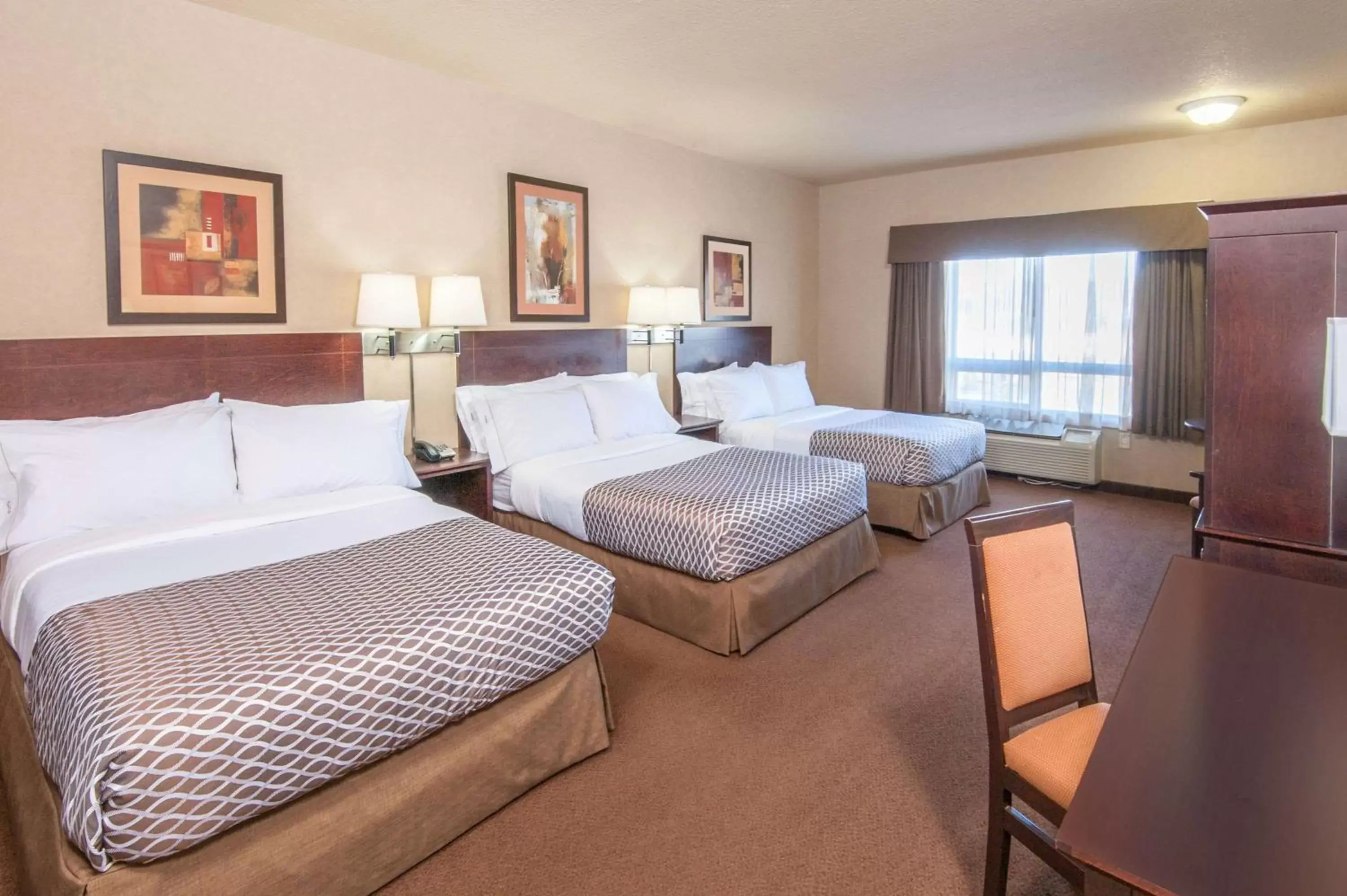 Photo of the whole room, Bed in Ramada by Wyndham Drumheller Hotel & Suites