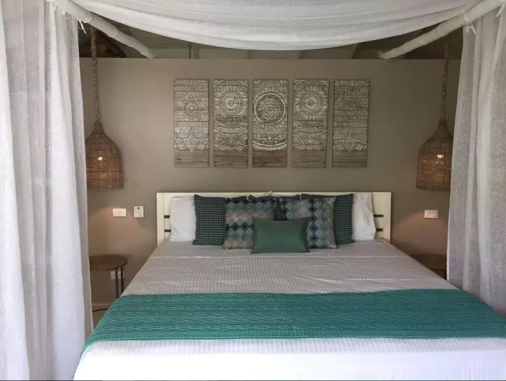 Bed in Mahona Boutique Hotel