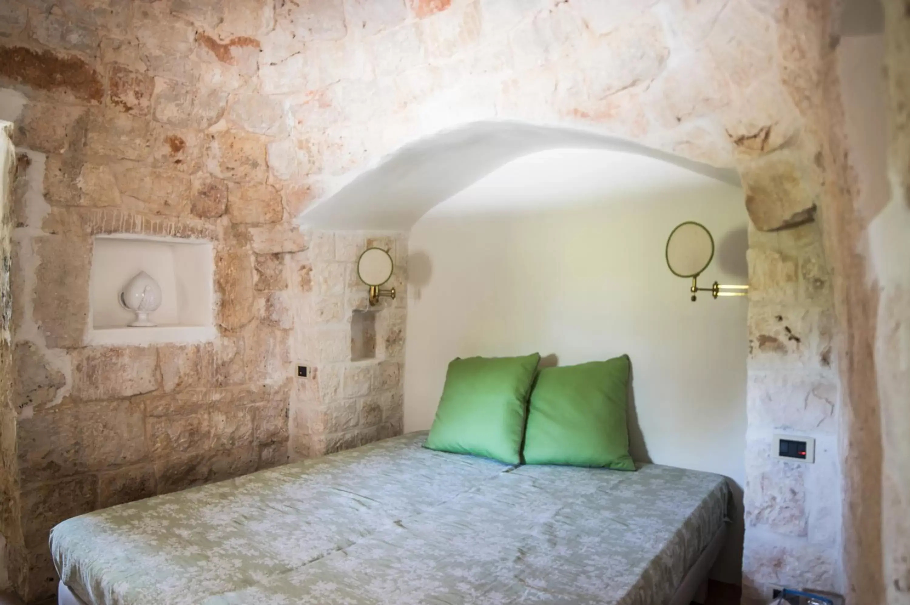 Bed in Relais Trulli Le Icone