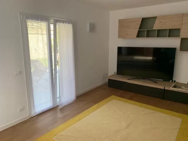 Communal lounge/ TV room in Le Stanze del Brigante