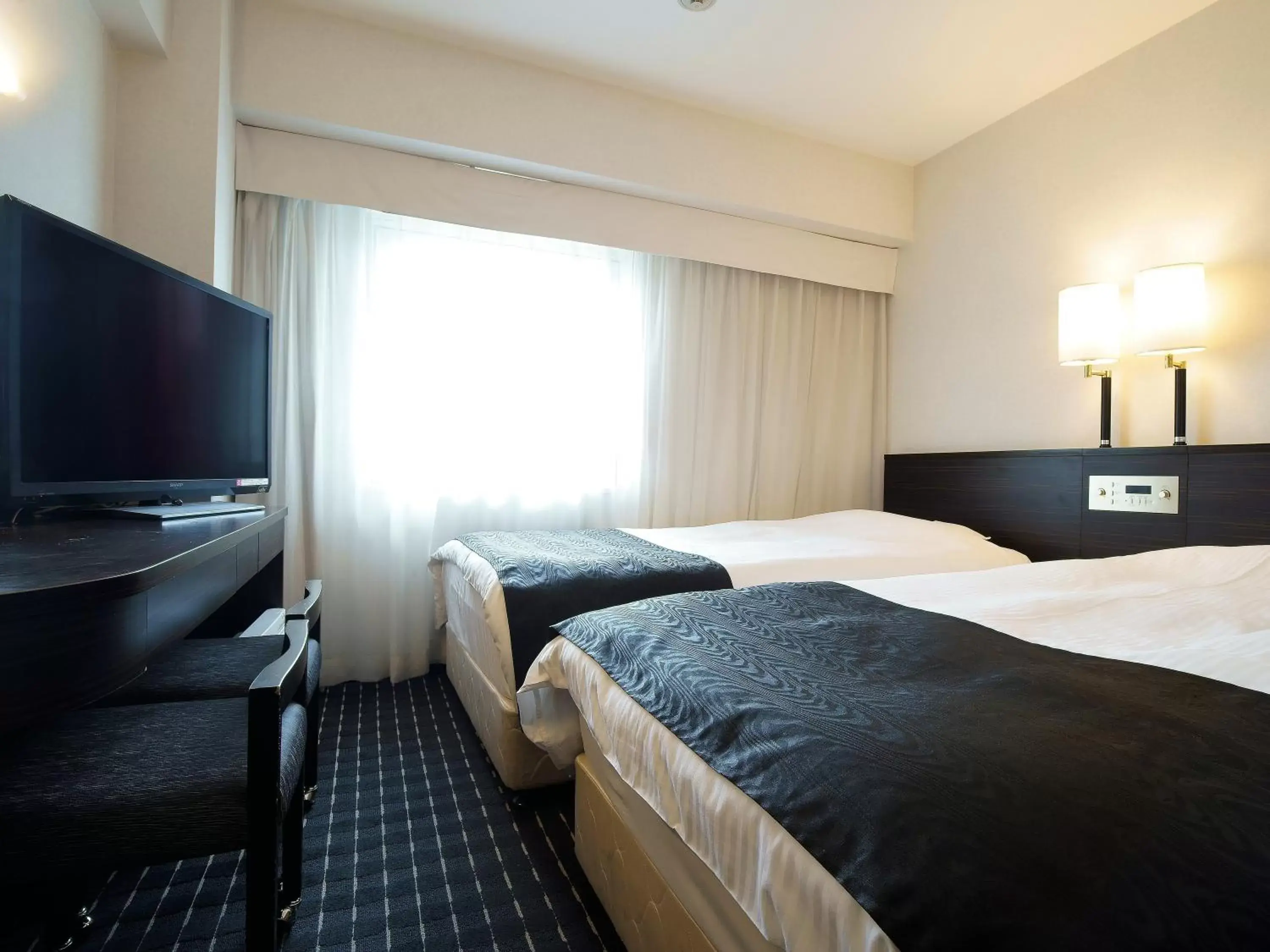 Bed in APA Hotel Tennoji-Ekimae