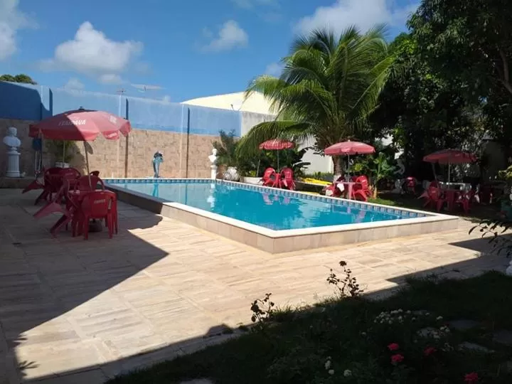 Swimming Pool in Pousada Das Palmeiras
