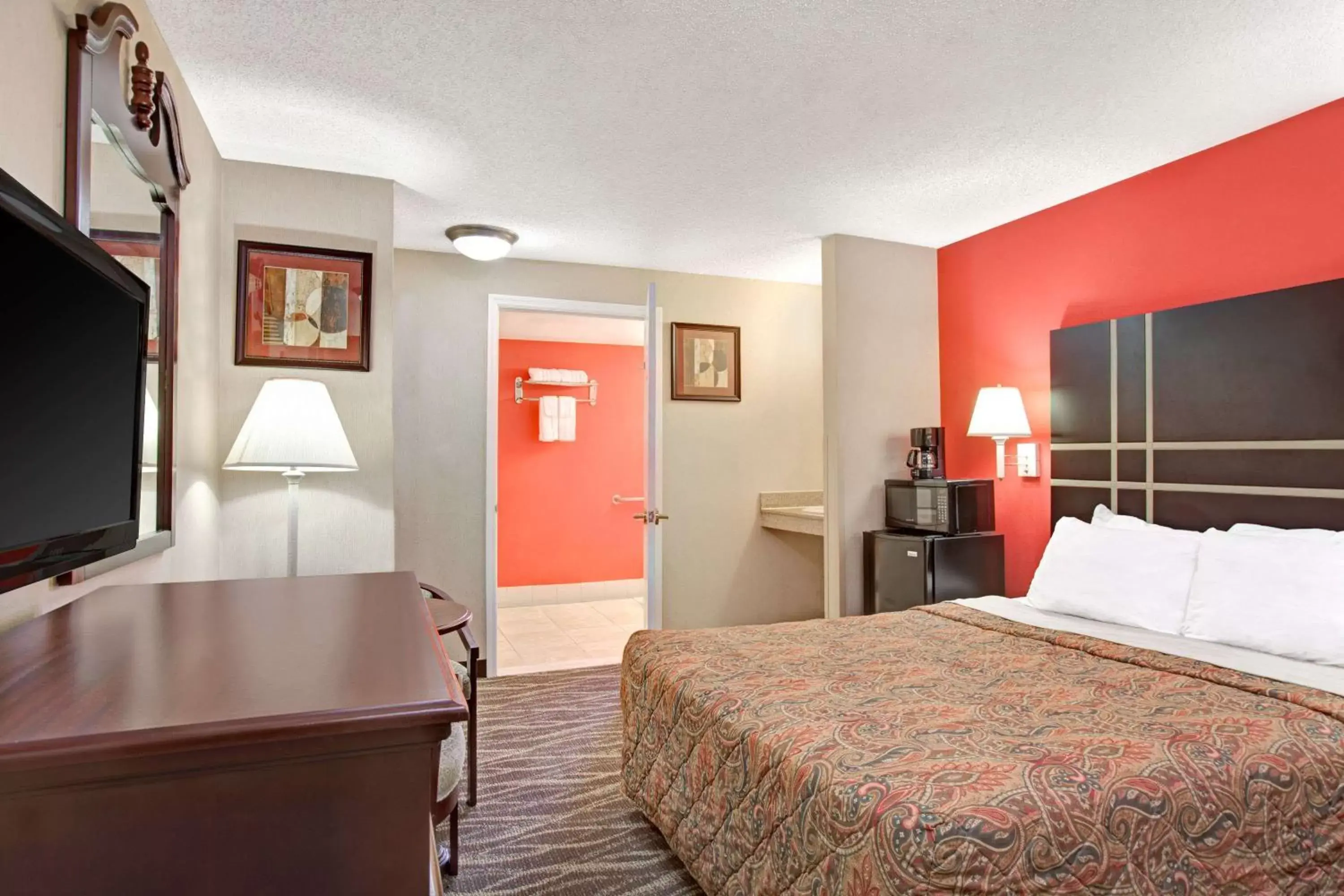 Photo of the whole room, Bed in Days Inn by Wyndham Ridgefield NJ