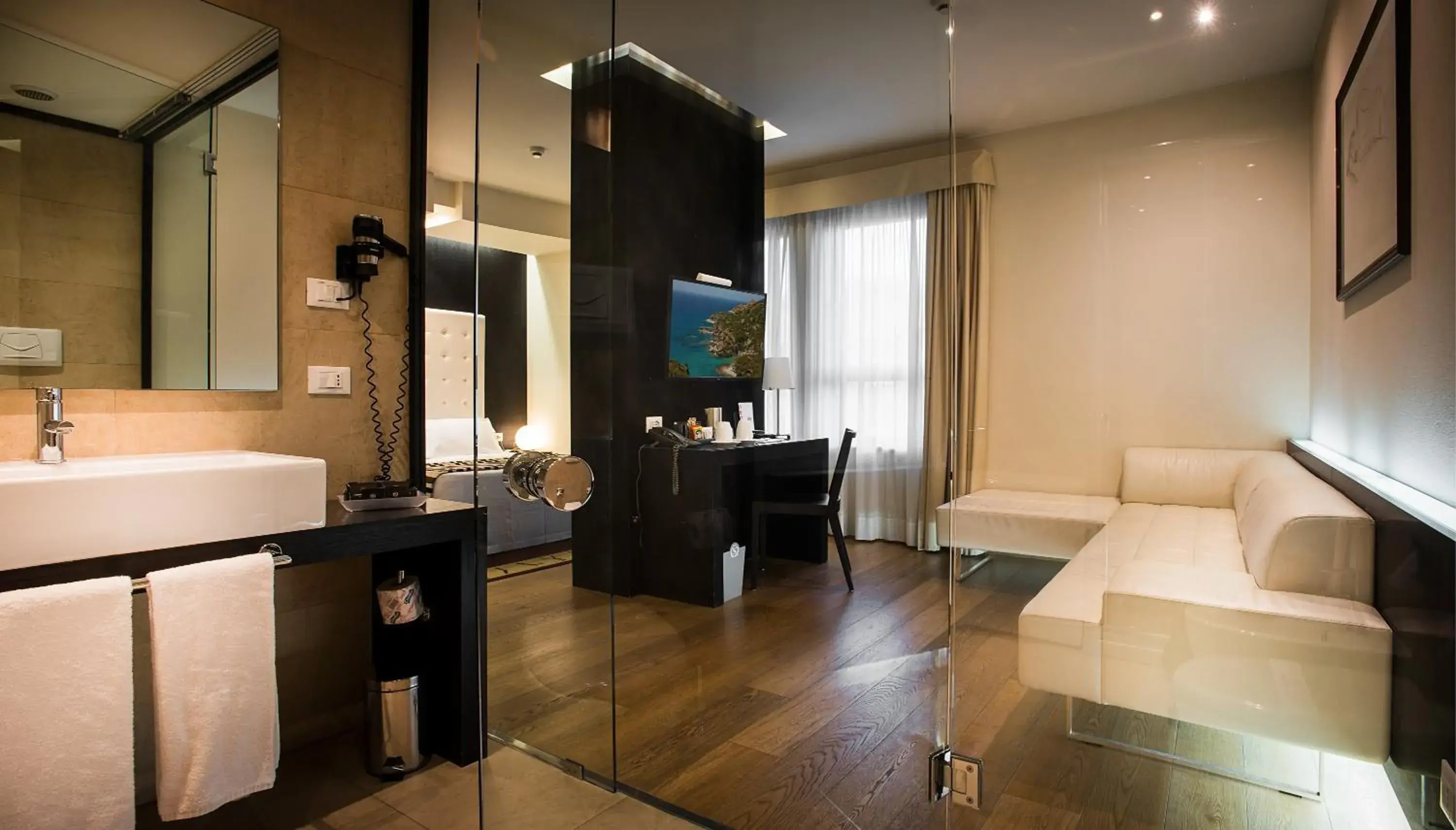 Bedroom in Sardegna Hotel - Suites & Restaurant